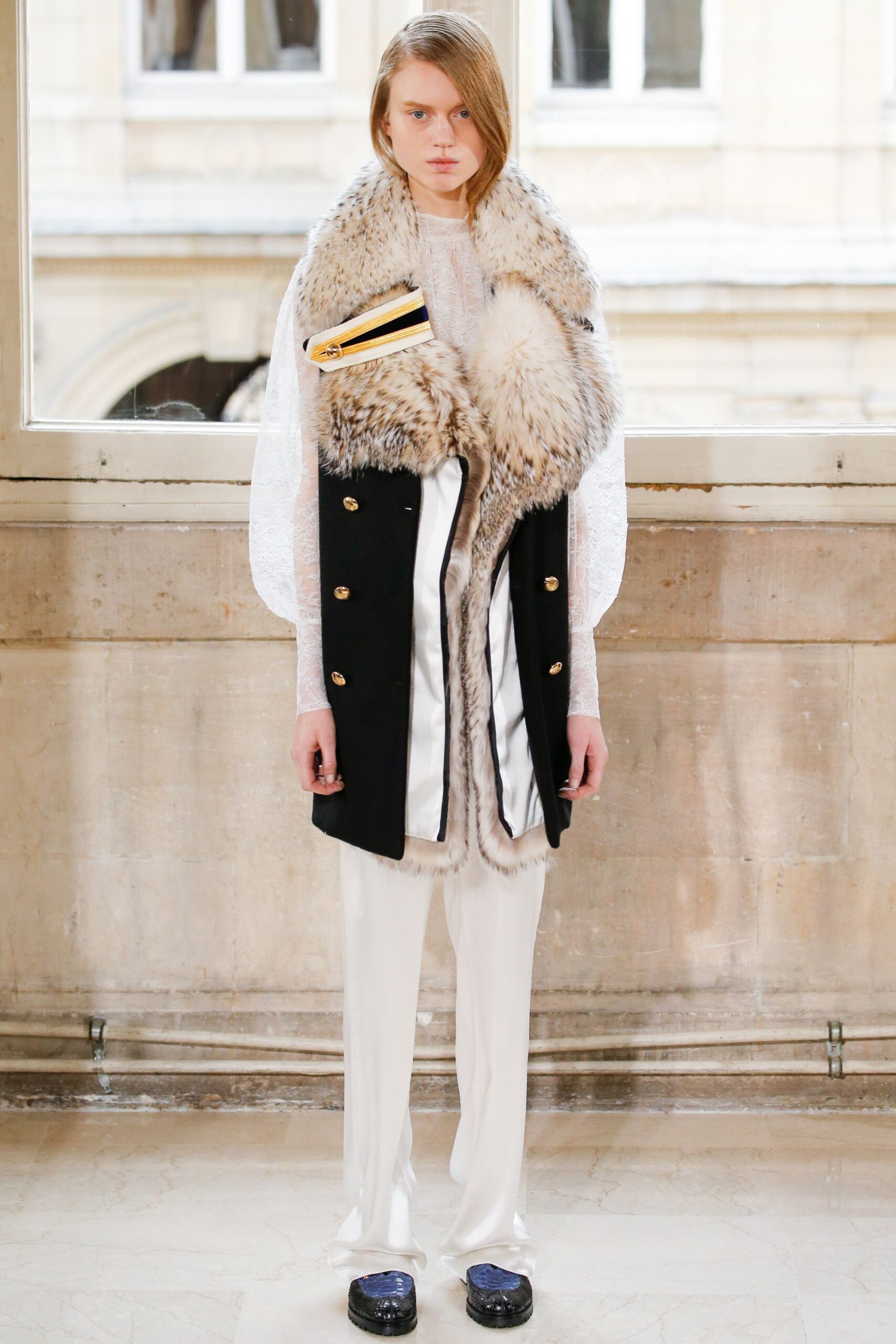 fur-trimmed black open-front coat