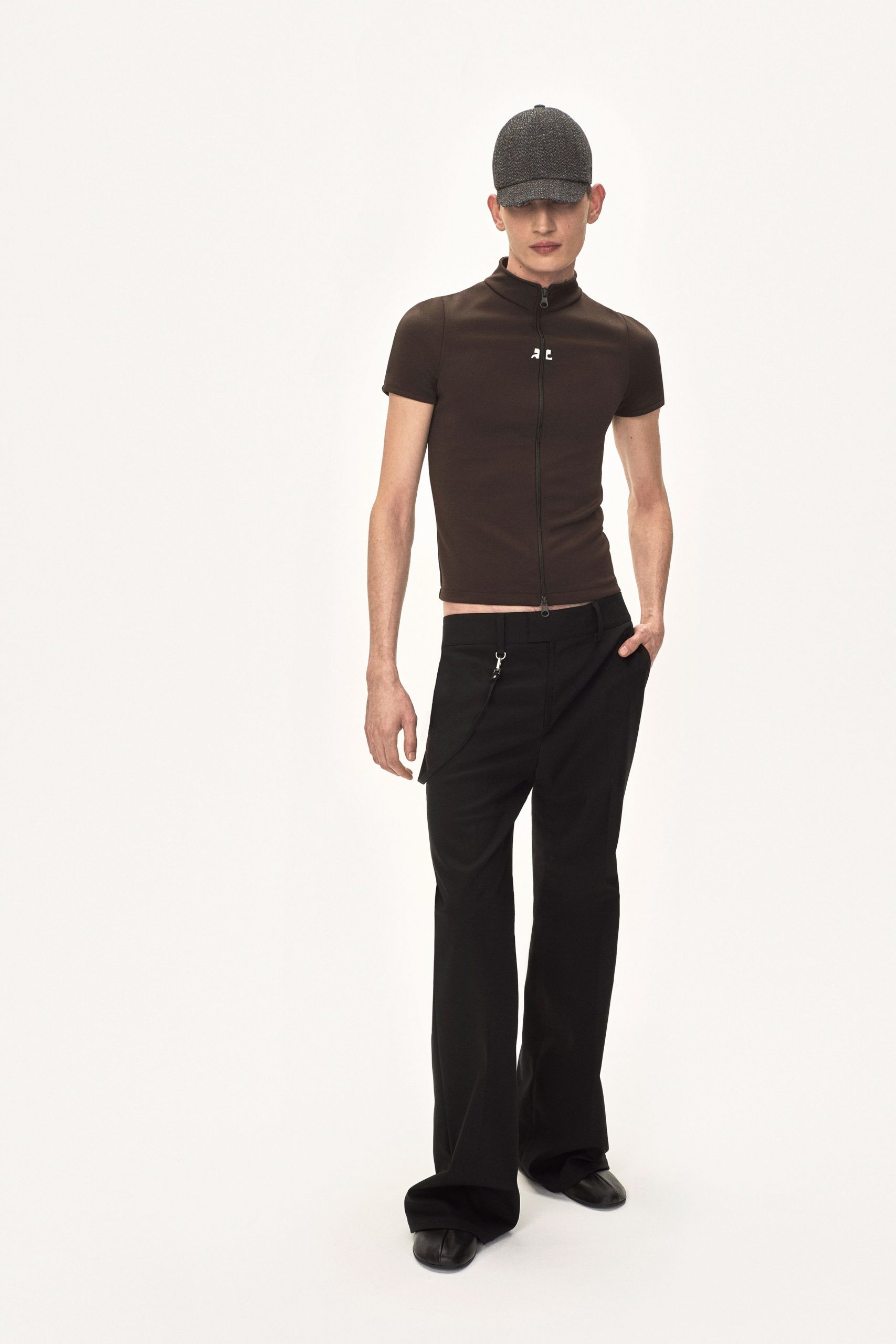 brown fitted top with black pants