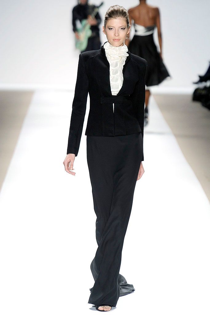 ruffled high-neck white blouse