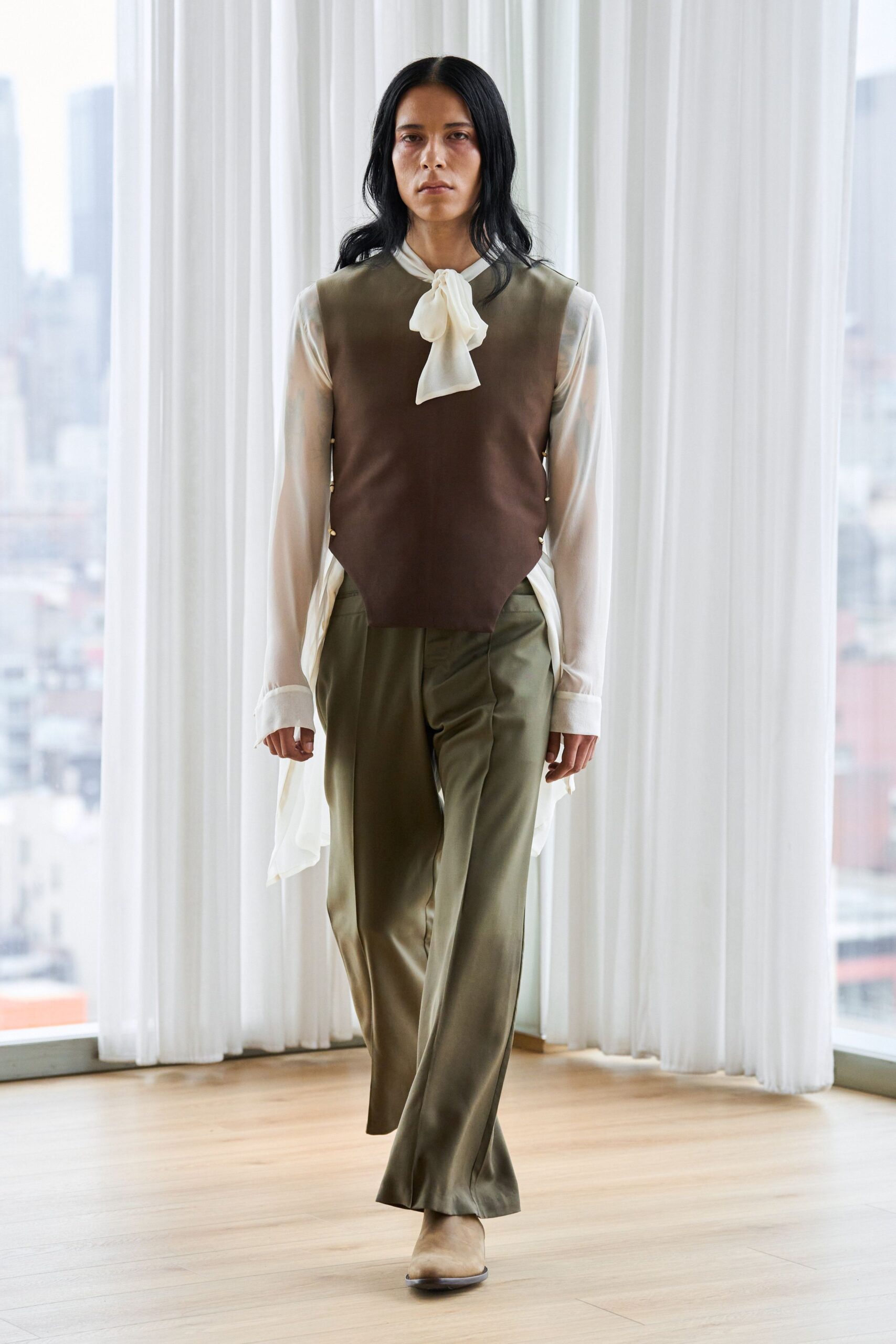 white silk top with brown vest