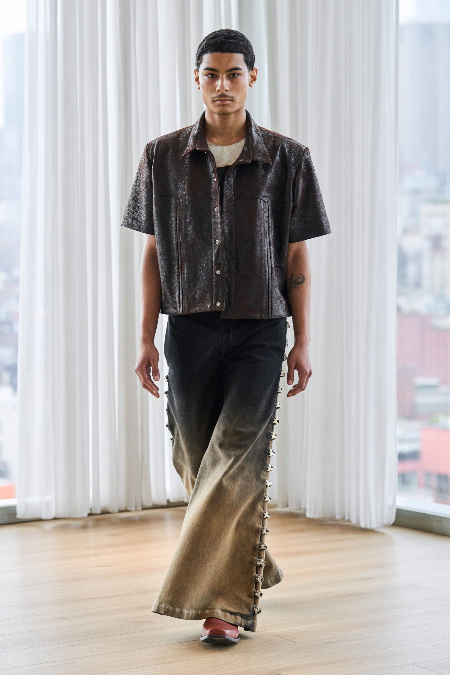 brown leather shirt with flared pants