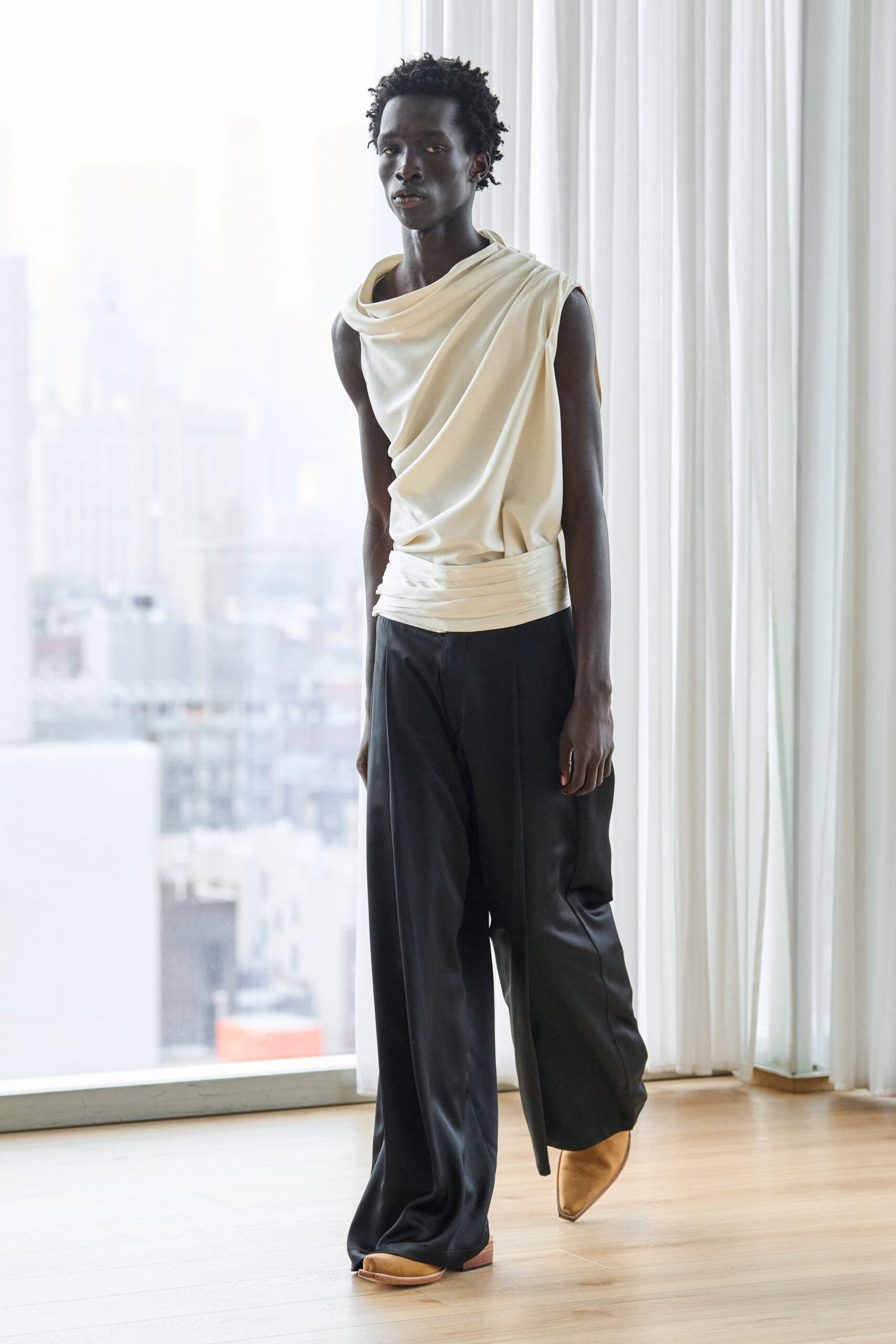 white draped top with black pants