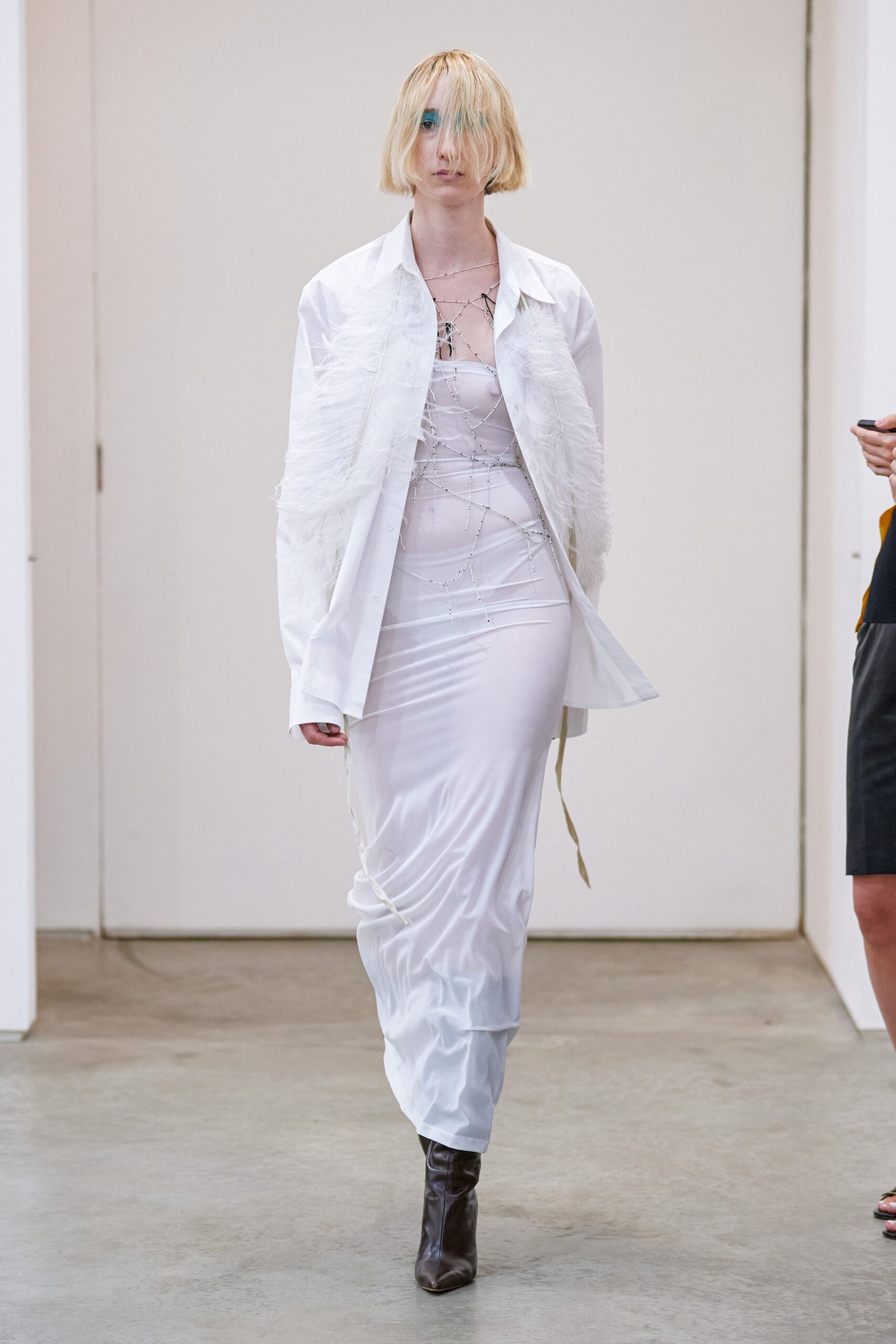 white feather-trim shirt over strapless maxi dress