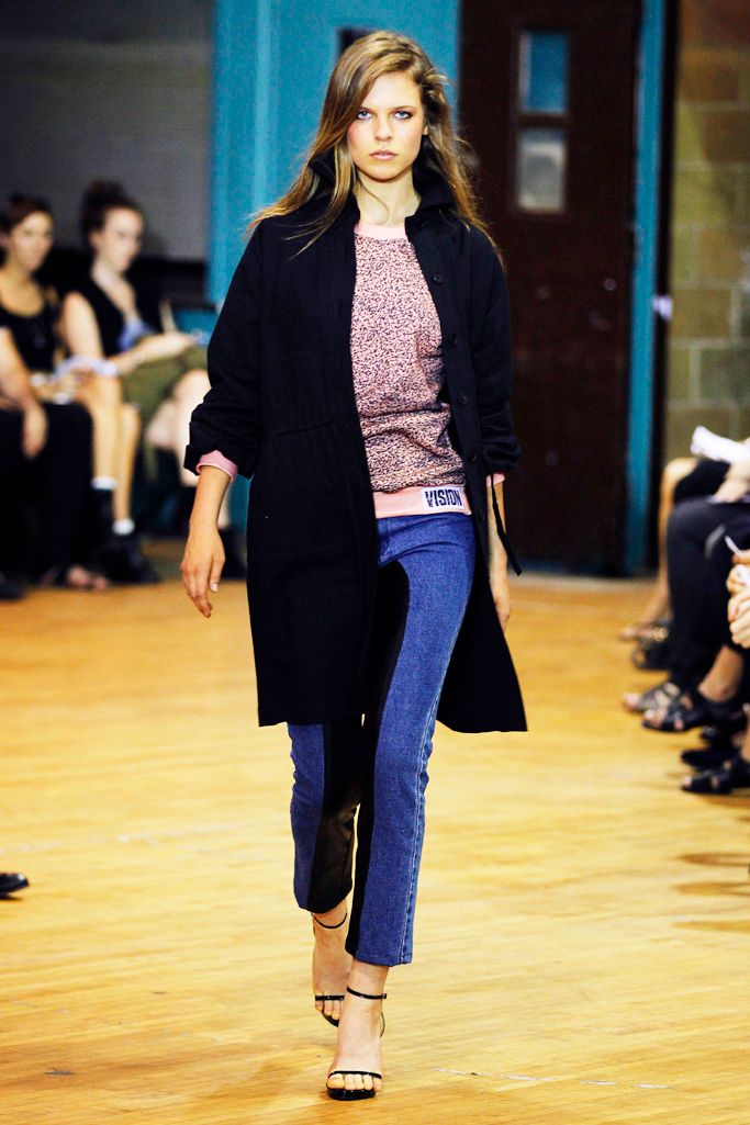 pink printed top with black coat