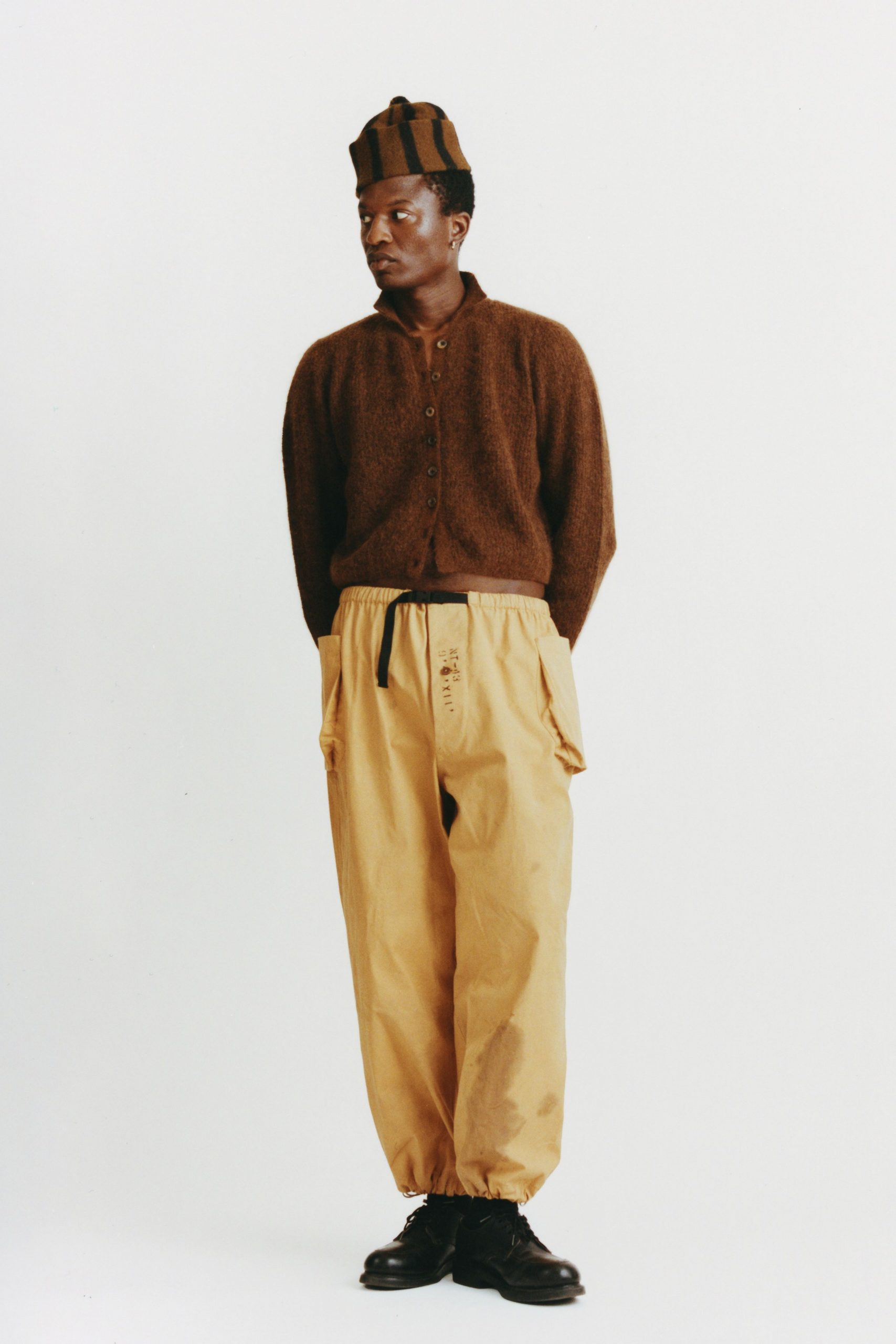 brown wool cardigan with beige pants