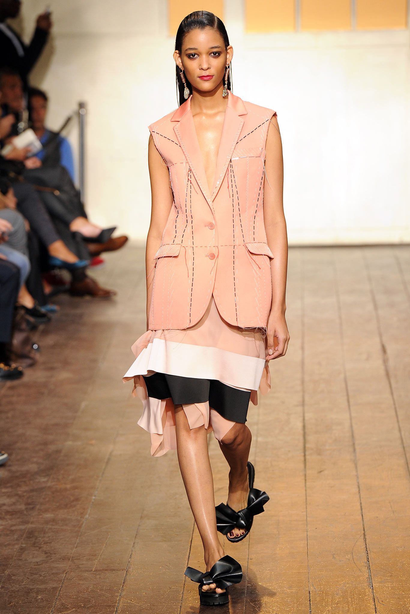 raw-edge sleeveless blazer with handkerchief skirt