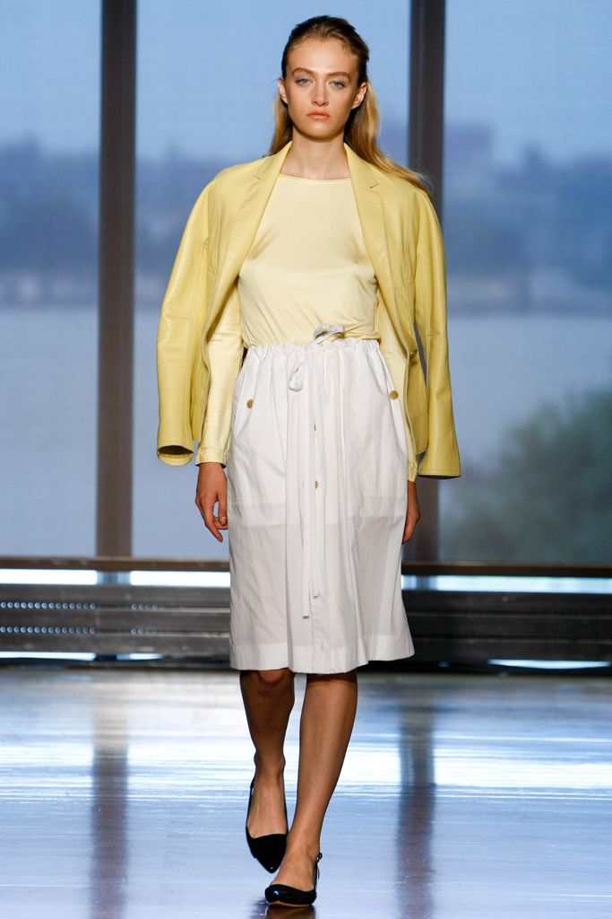yellow leather jacket with white midi skirt