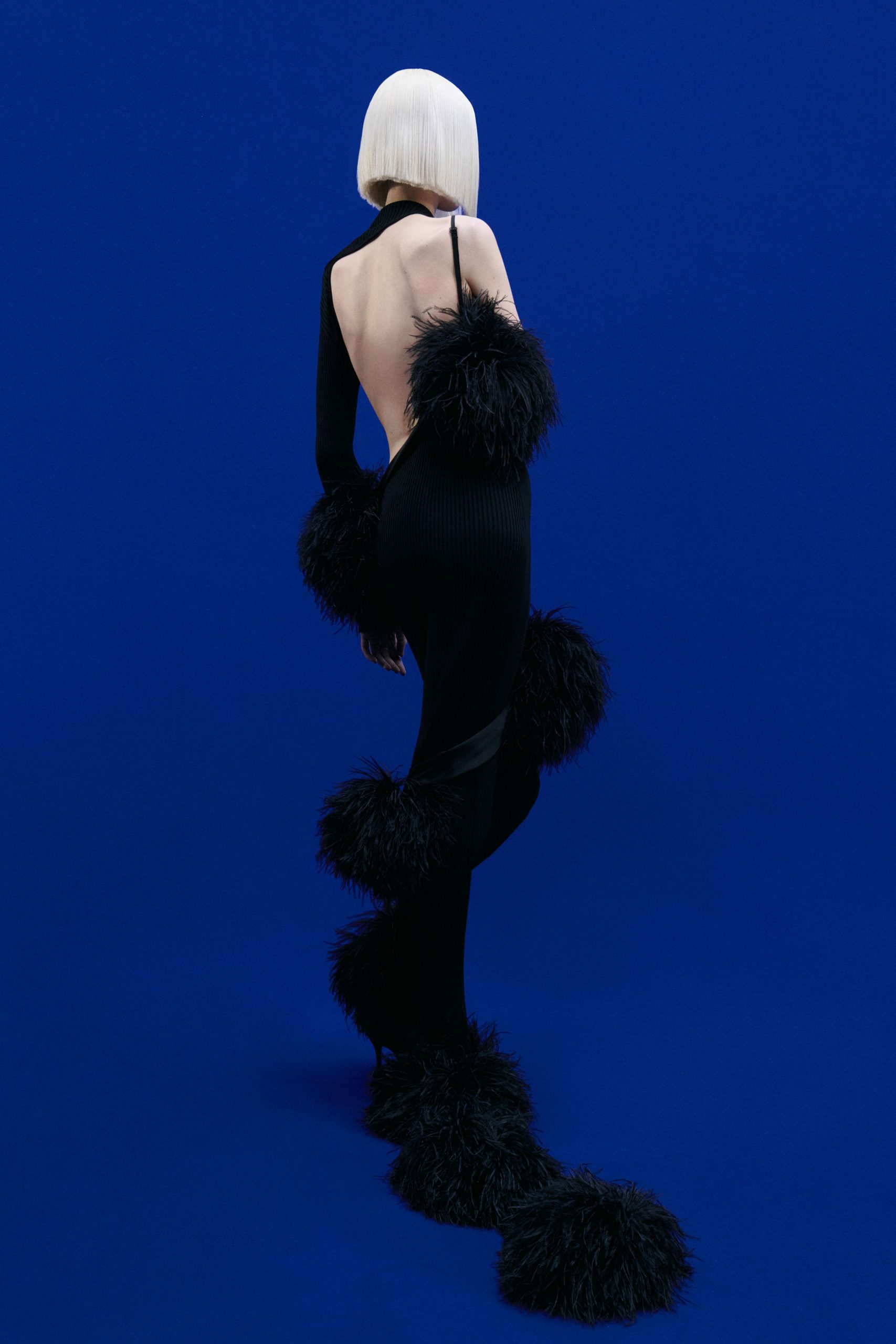 black fitted gown with fringes