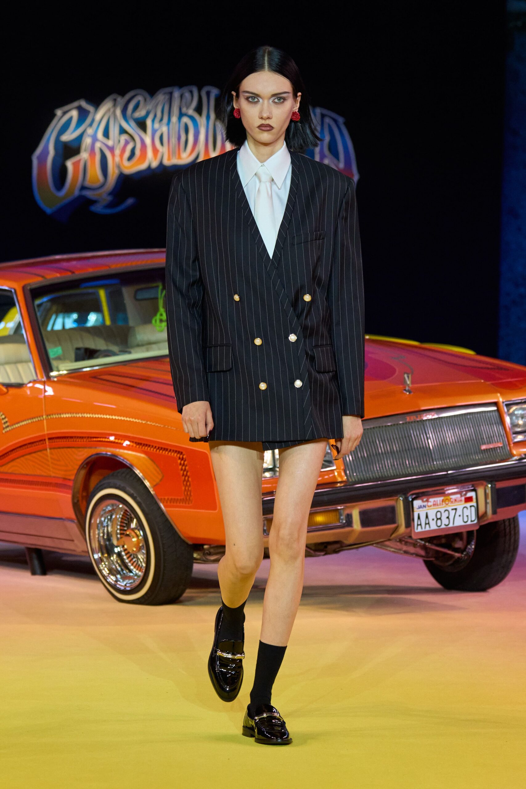 black striped blazer with mini skirt