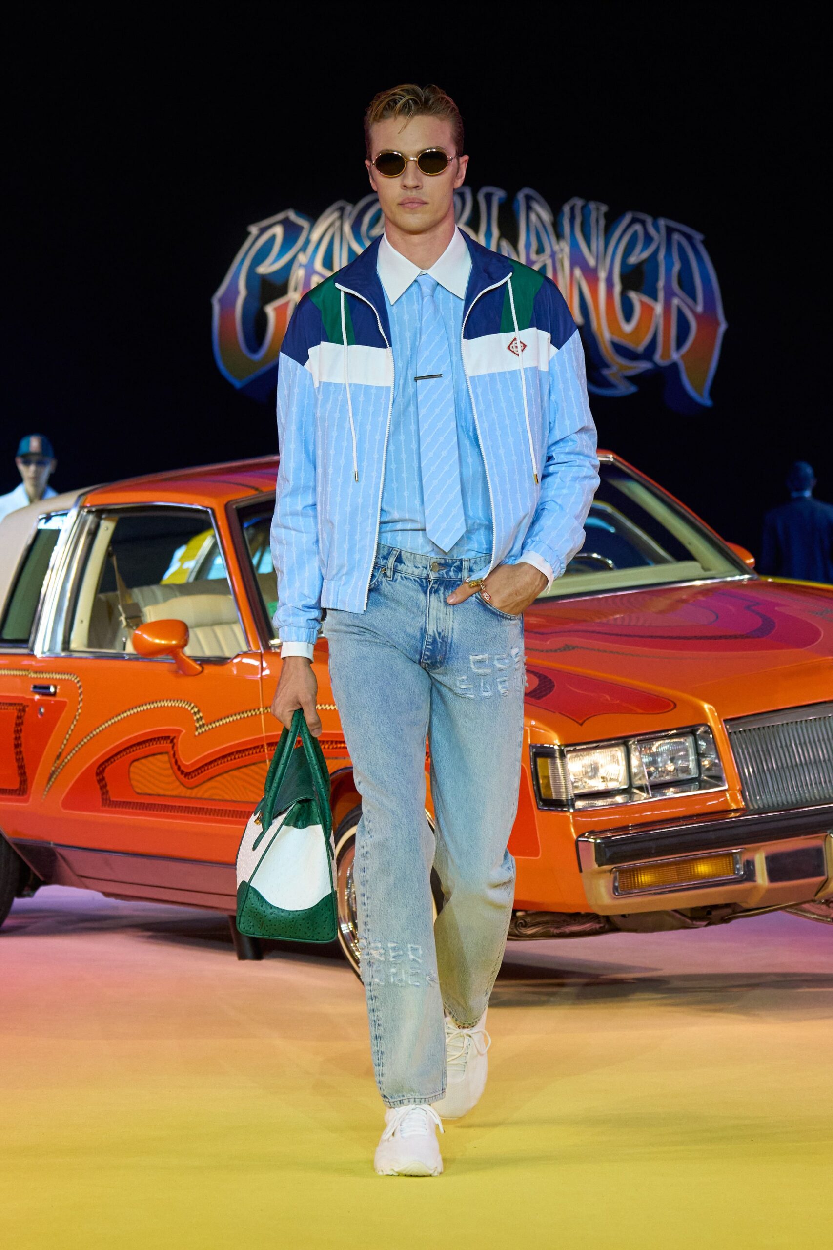 blue color-blocked jacket with denim pants