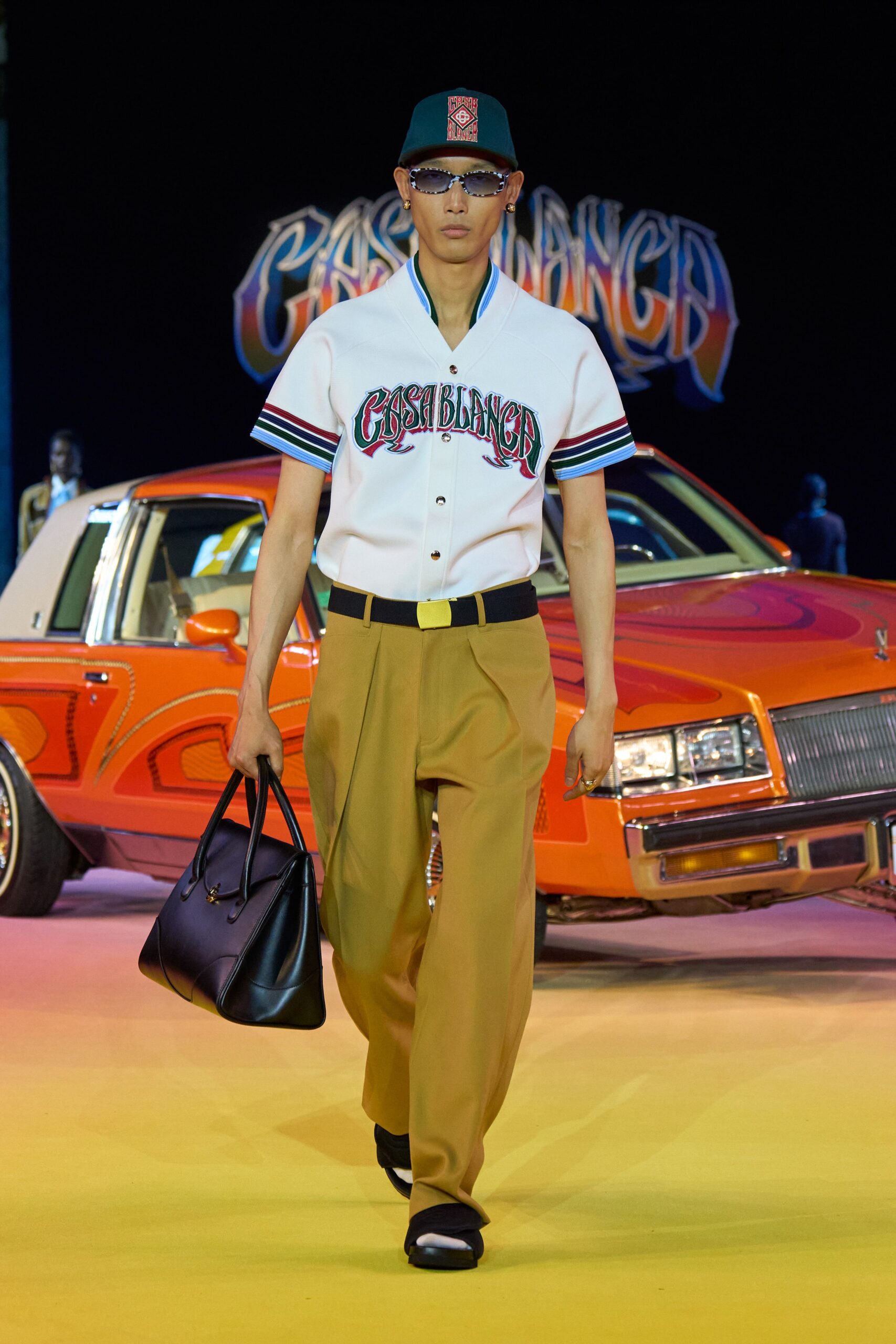 white embroidered shirt with beige pants