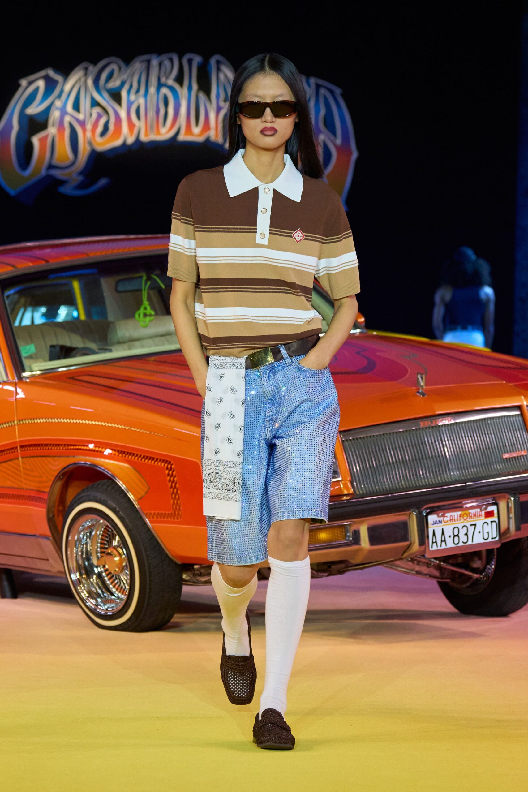 brown striped shirt with denim shorts