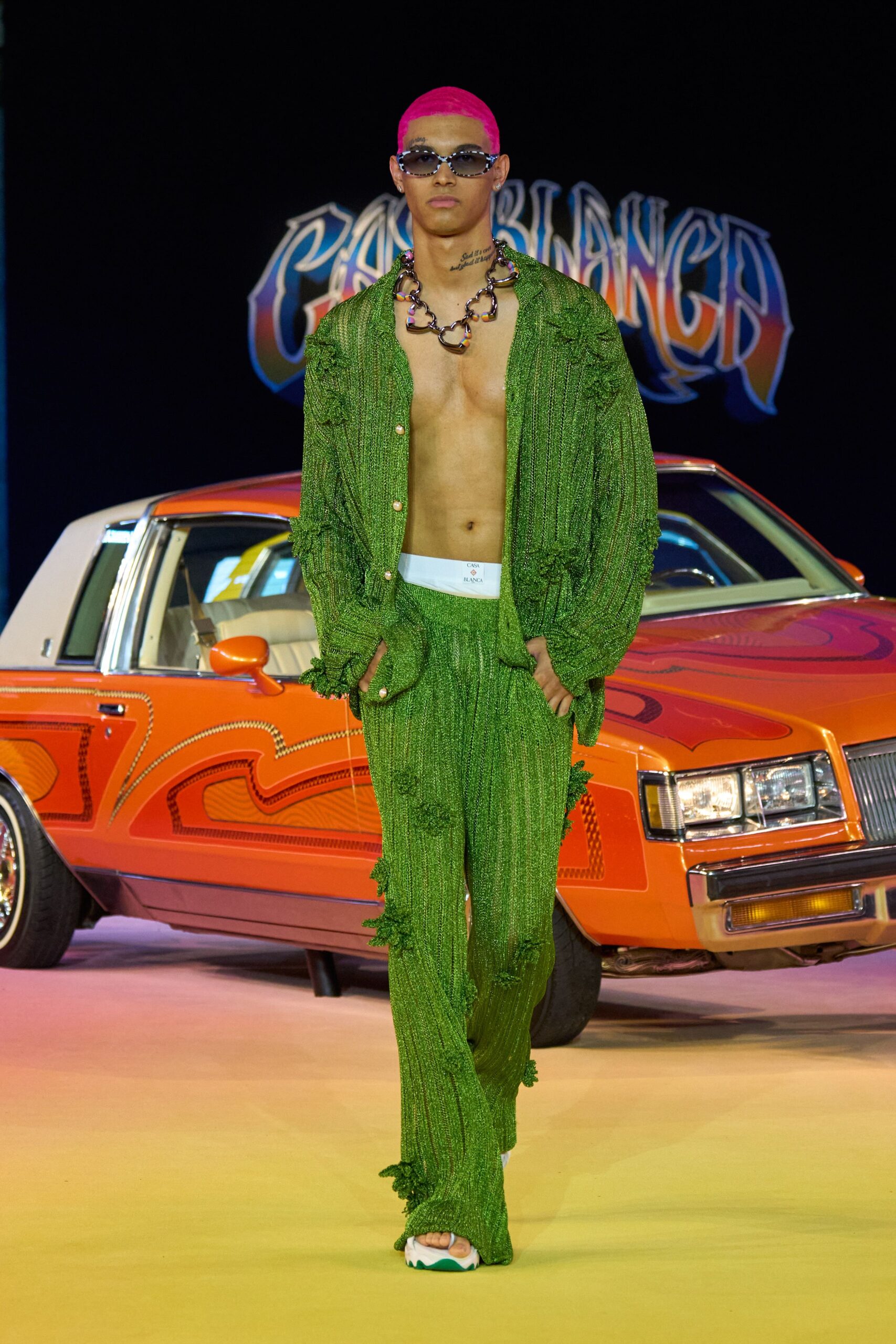 green fringed jacket and pants