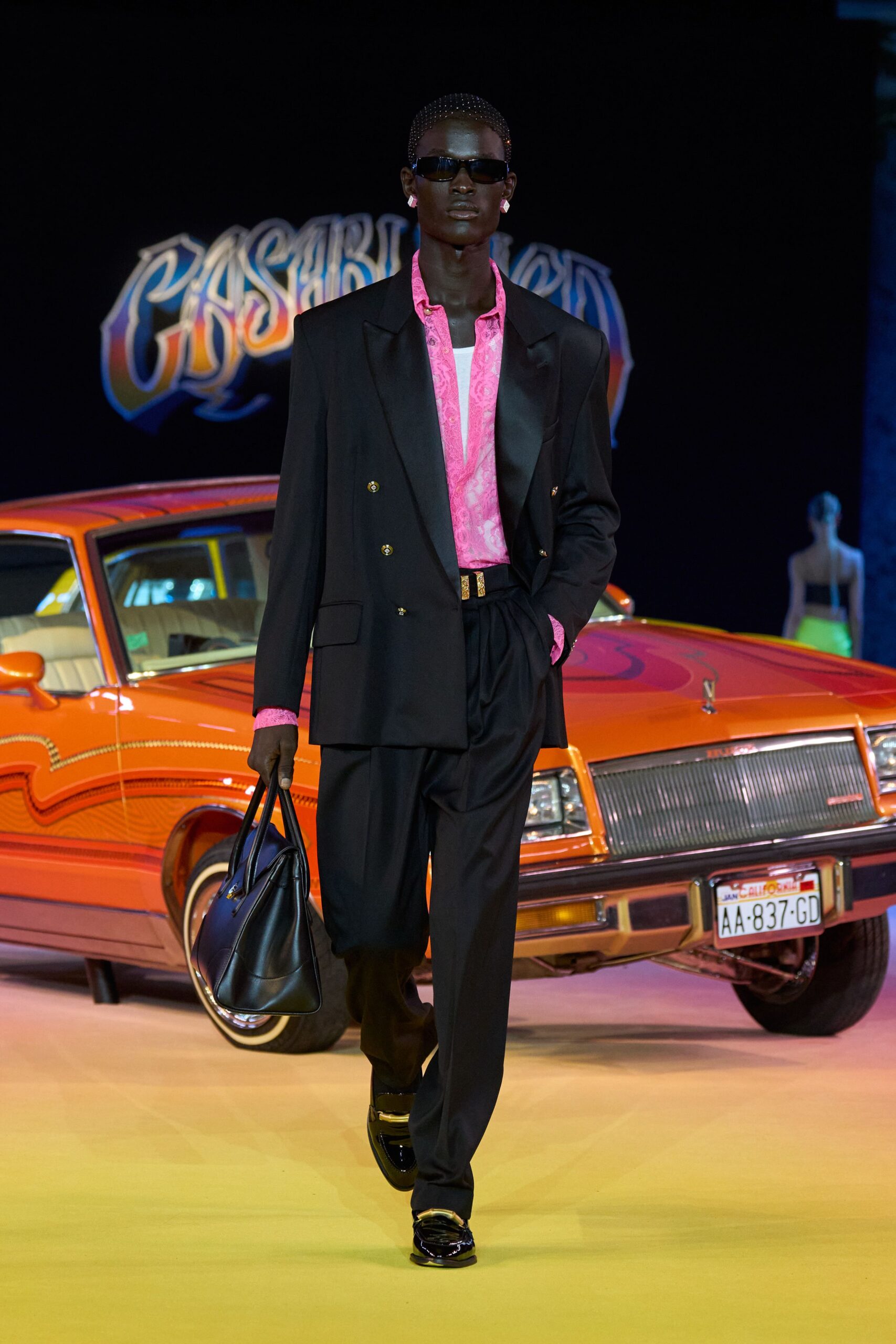 black tailored blazer with pink shirt