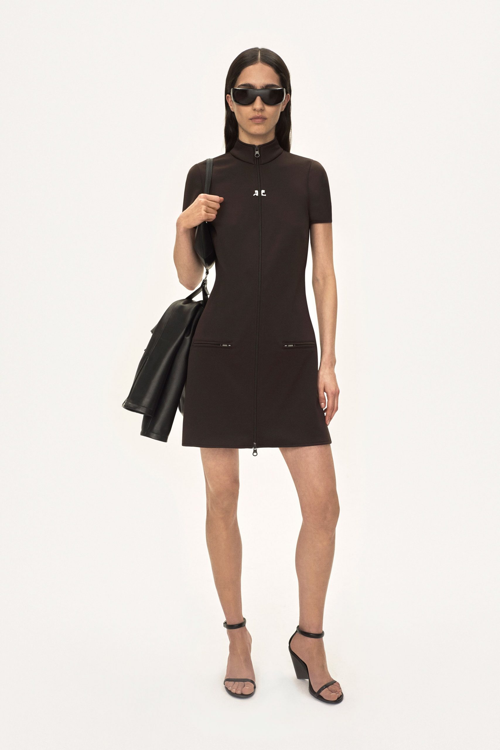 black fitted mini dress with accessories
