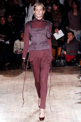 sheer high-neck top with corset overlay