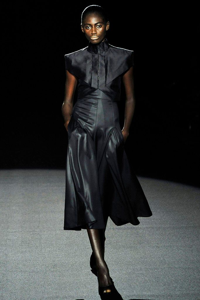 black satin high-neck sleeveless panelled pockets jumpsuit