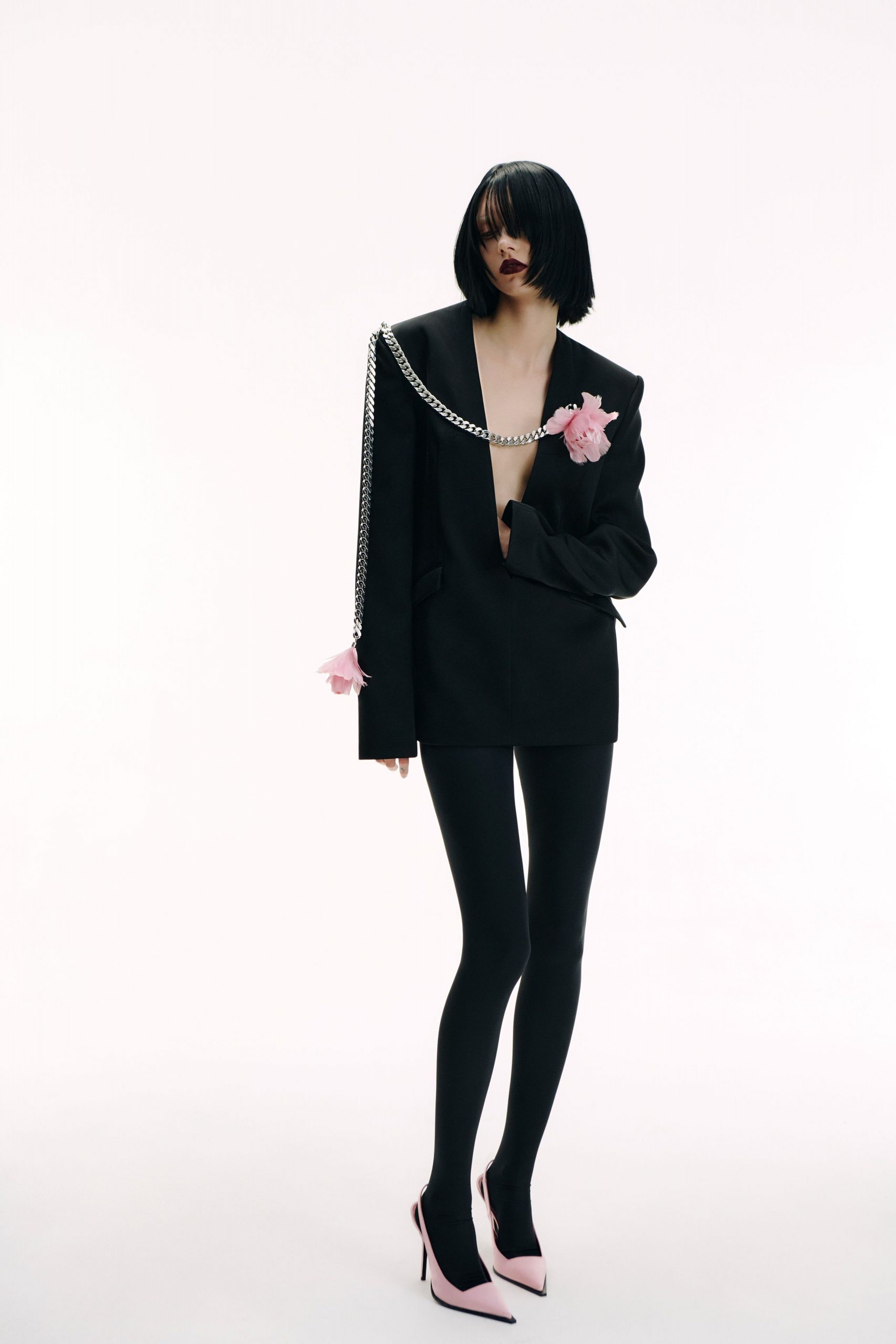black tailored blazer with pink heels