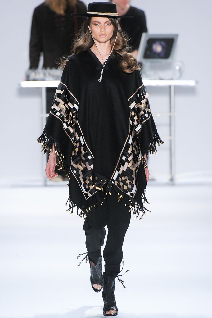 fringed geometric woven poncho