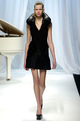 sculpted shoulder black mini dress