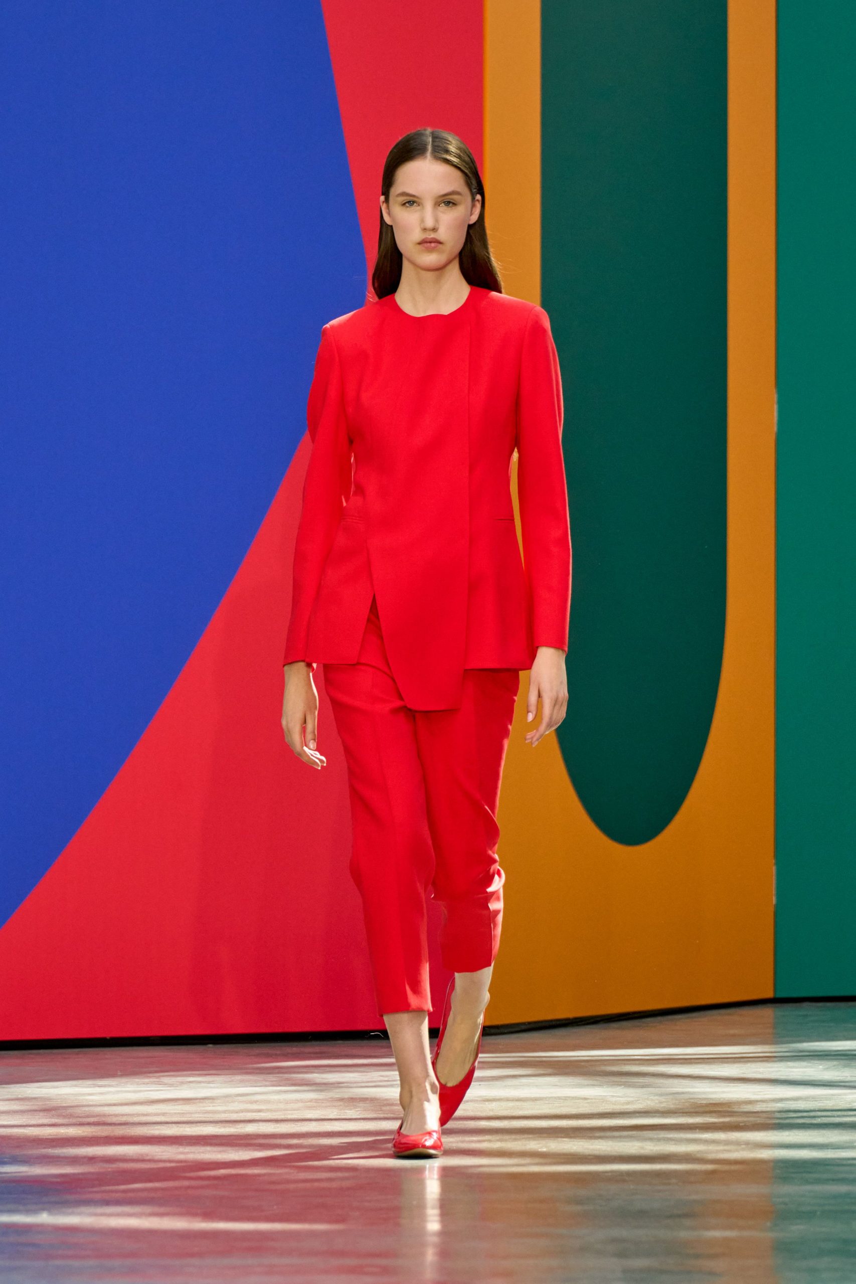 red tailored suit with heels
