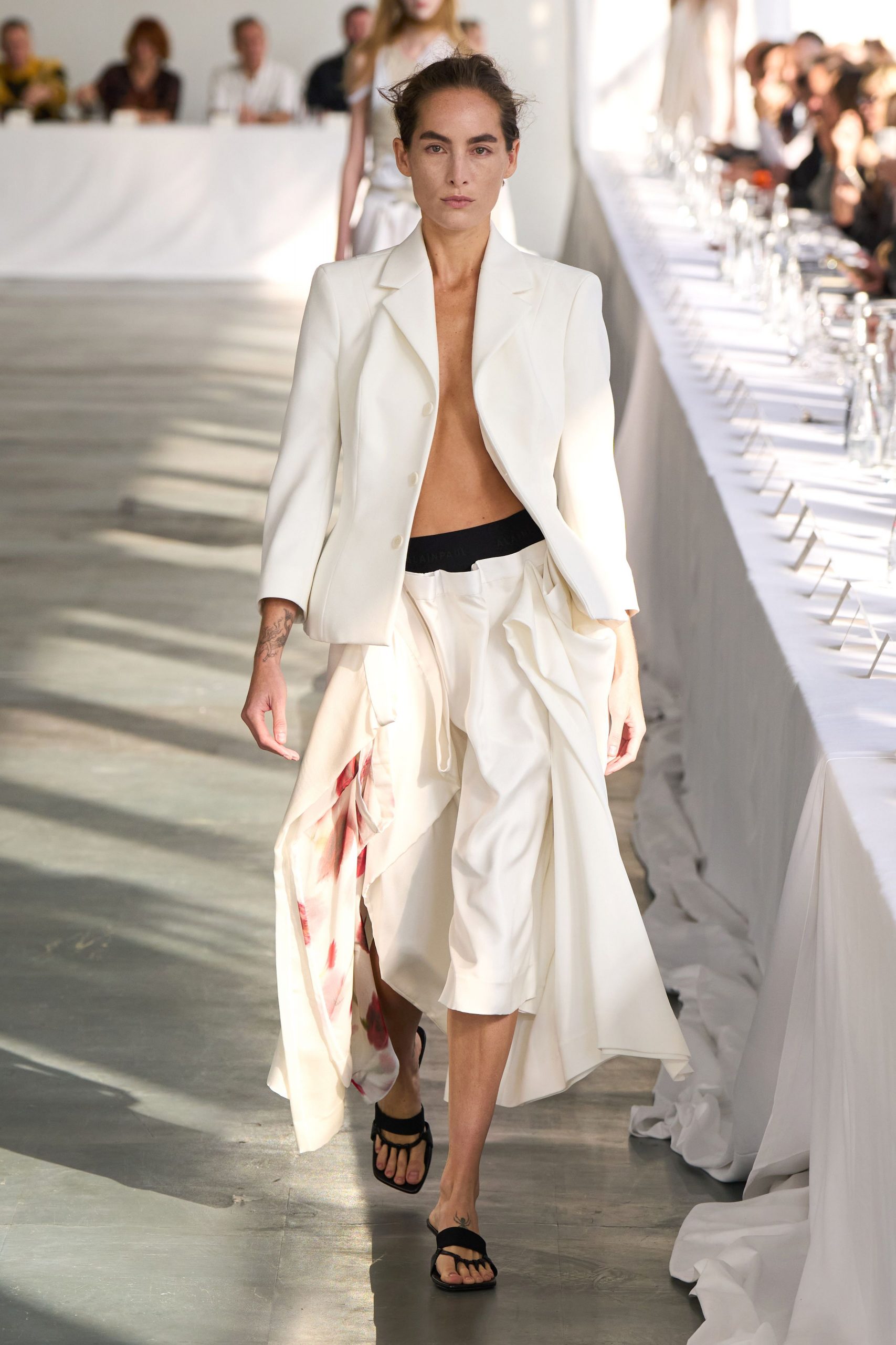 white blazer with relaxed pants
