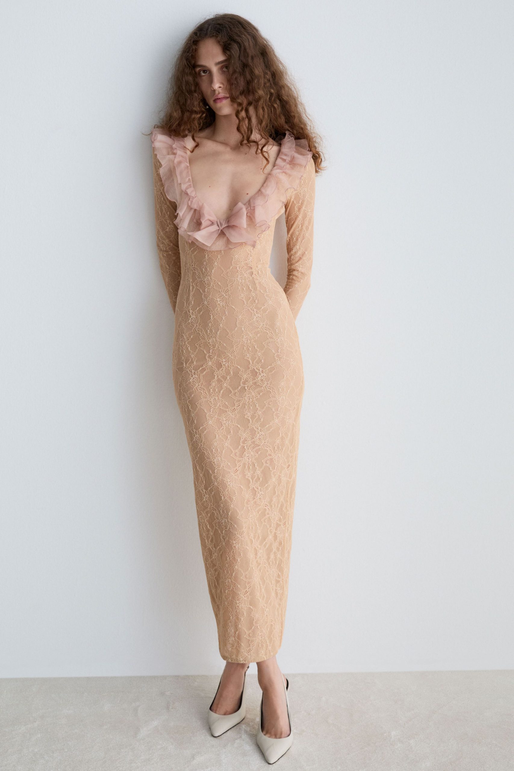 beige lace long-sleeve v-neck fitted ruffled embroidered gown