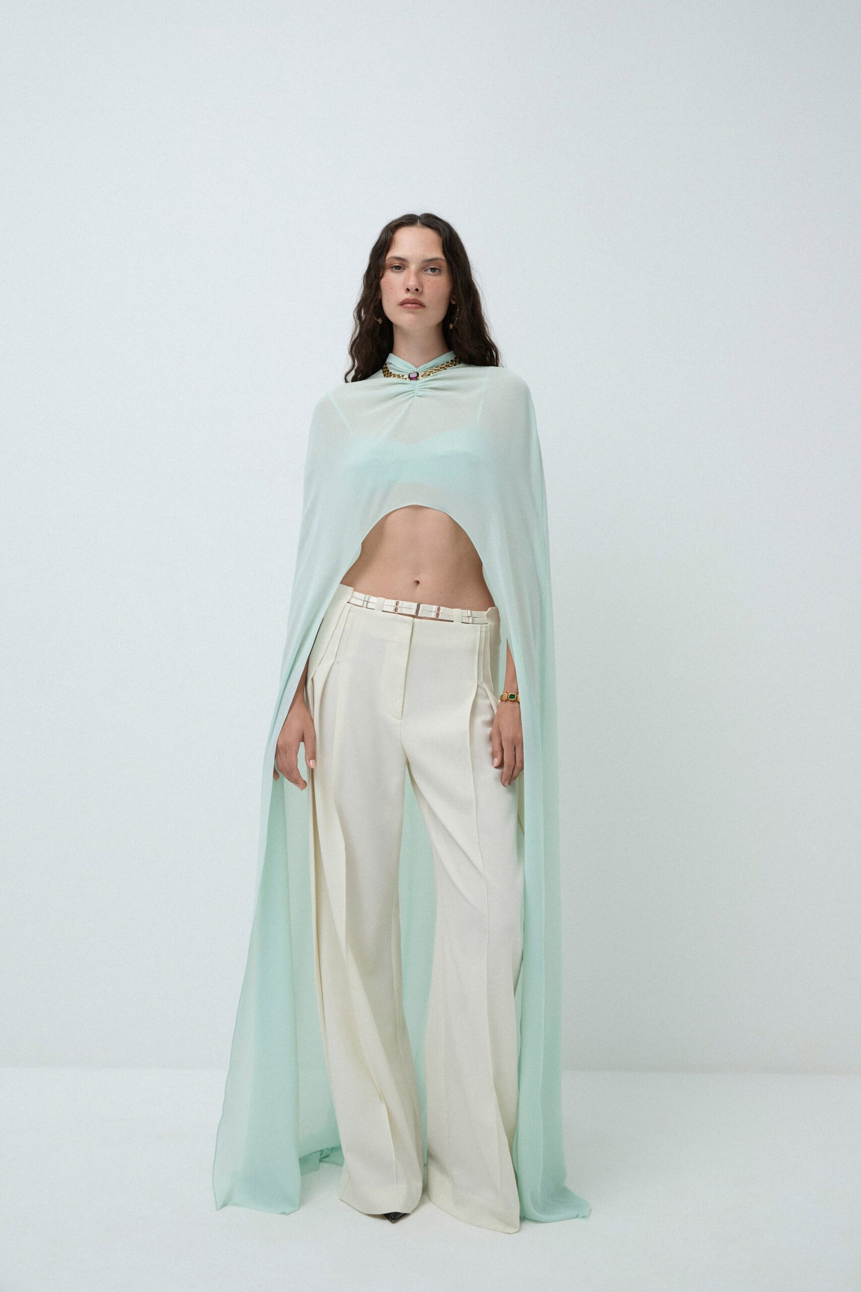 green chiffon sleeveless high-neck relaxed layered flowing cape