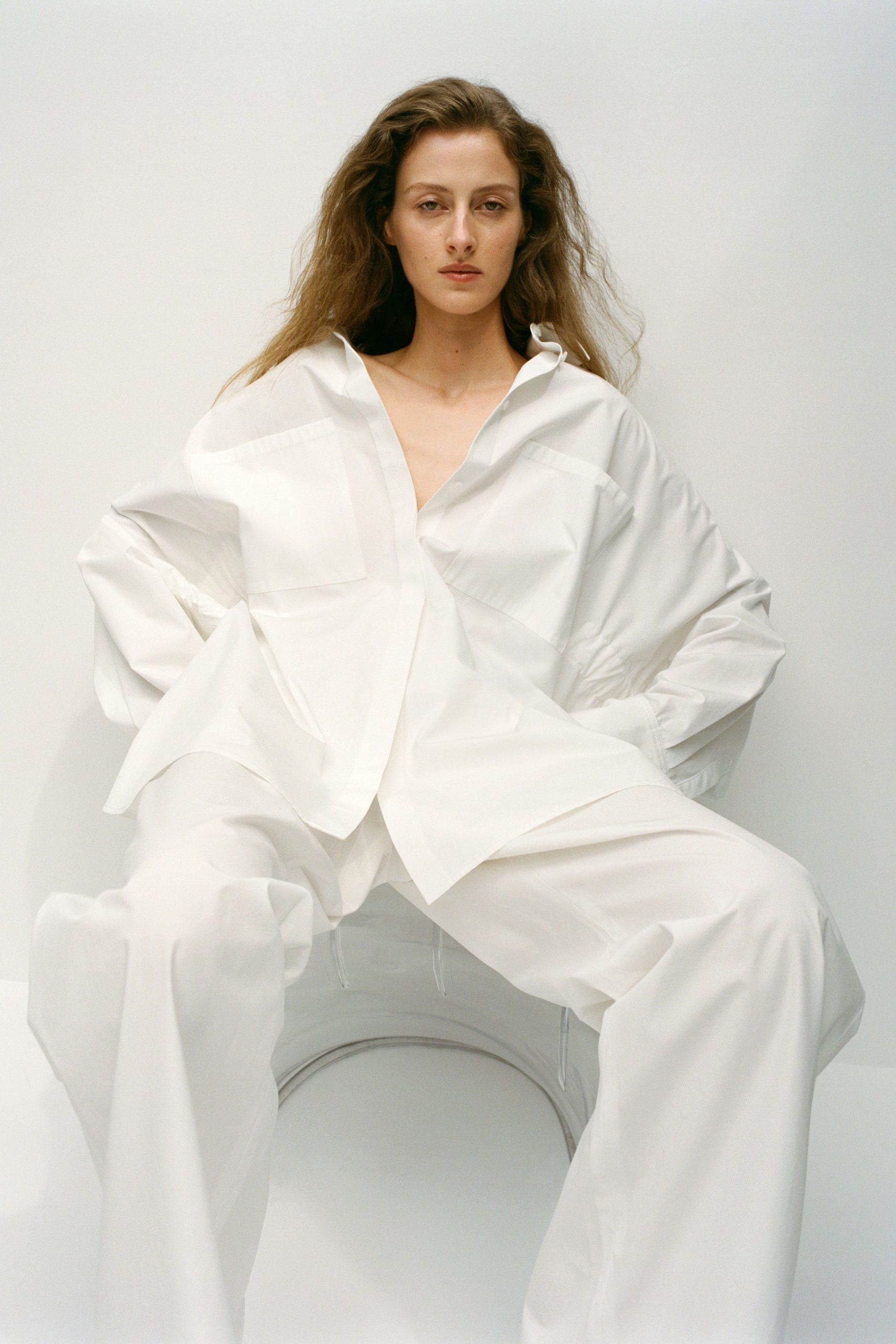 white relaxed shirt and pants