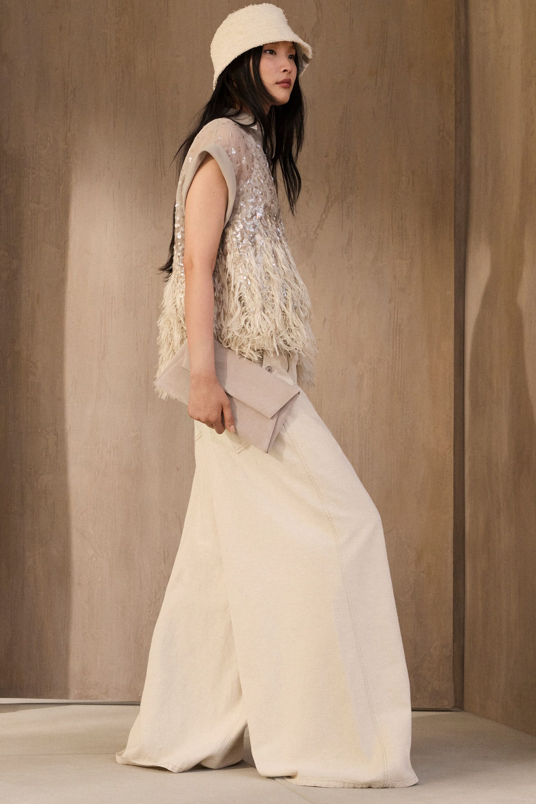 beige sequined top with wide-leg pants