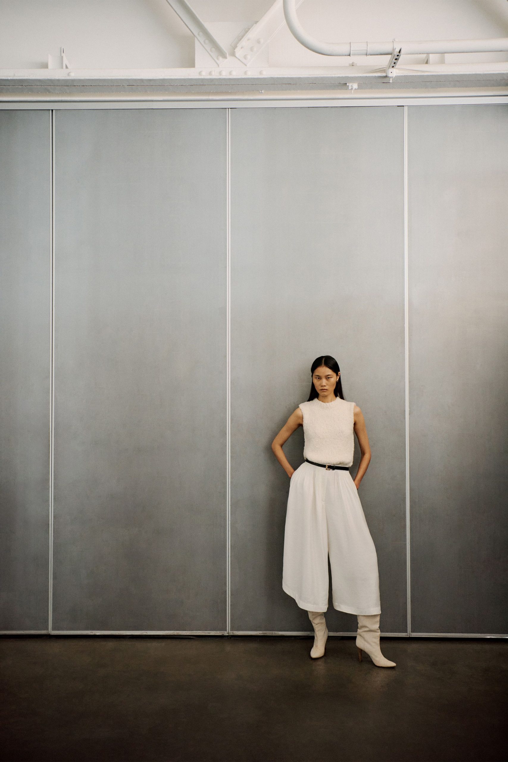 white cotton sleeveless high-neck fitted wide-leg jumpsuit
