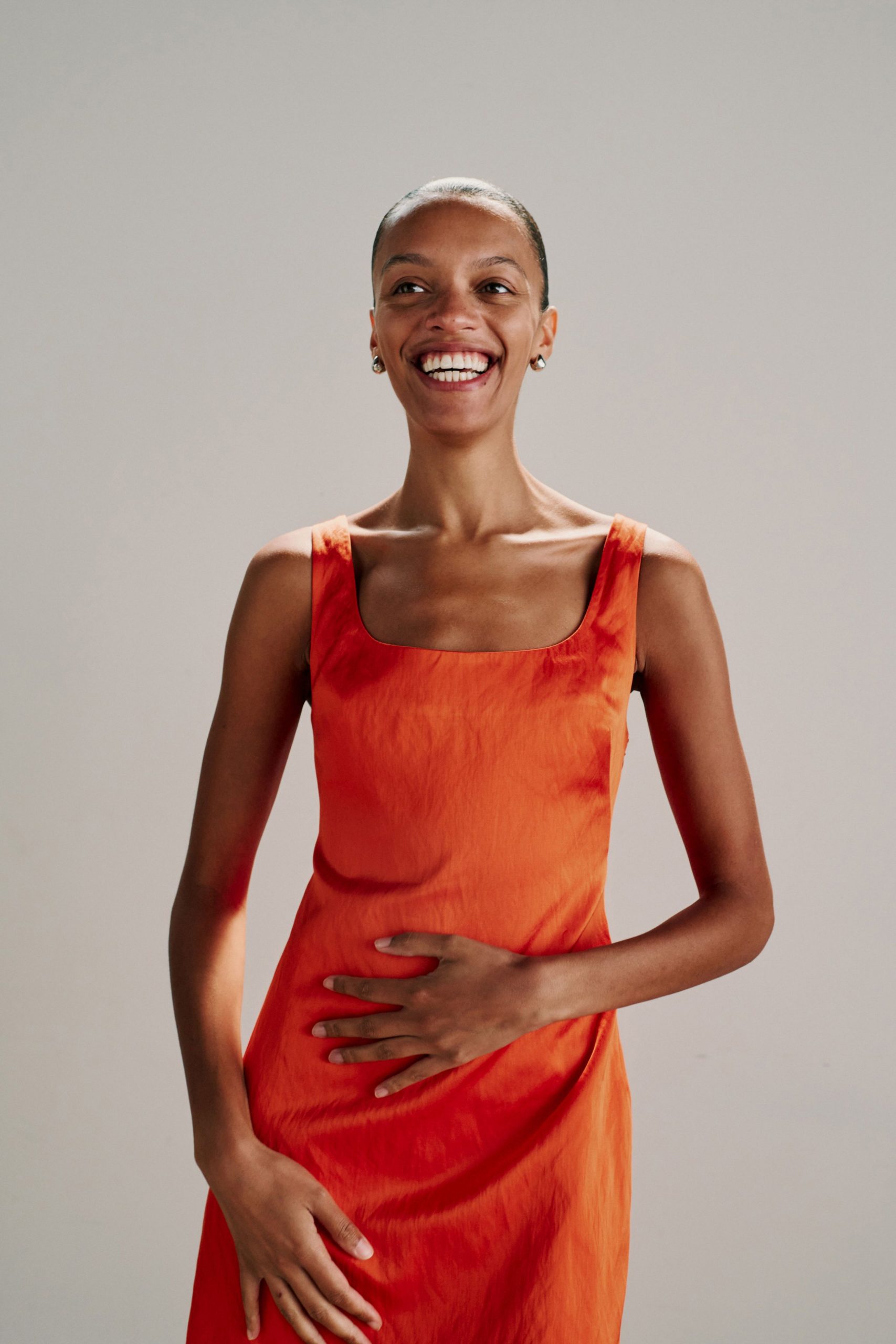fitted orange silk dress