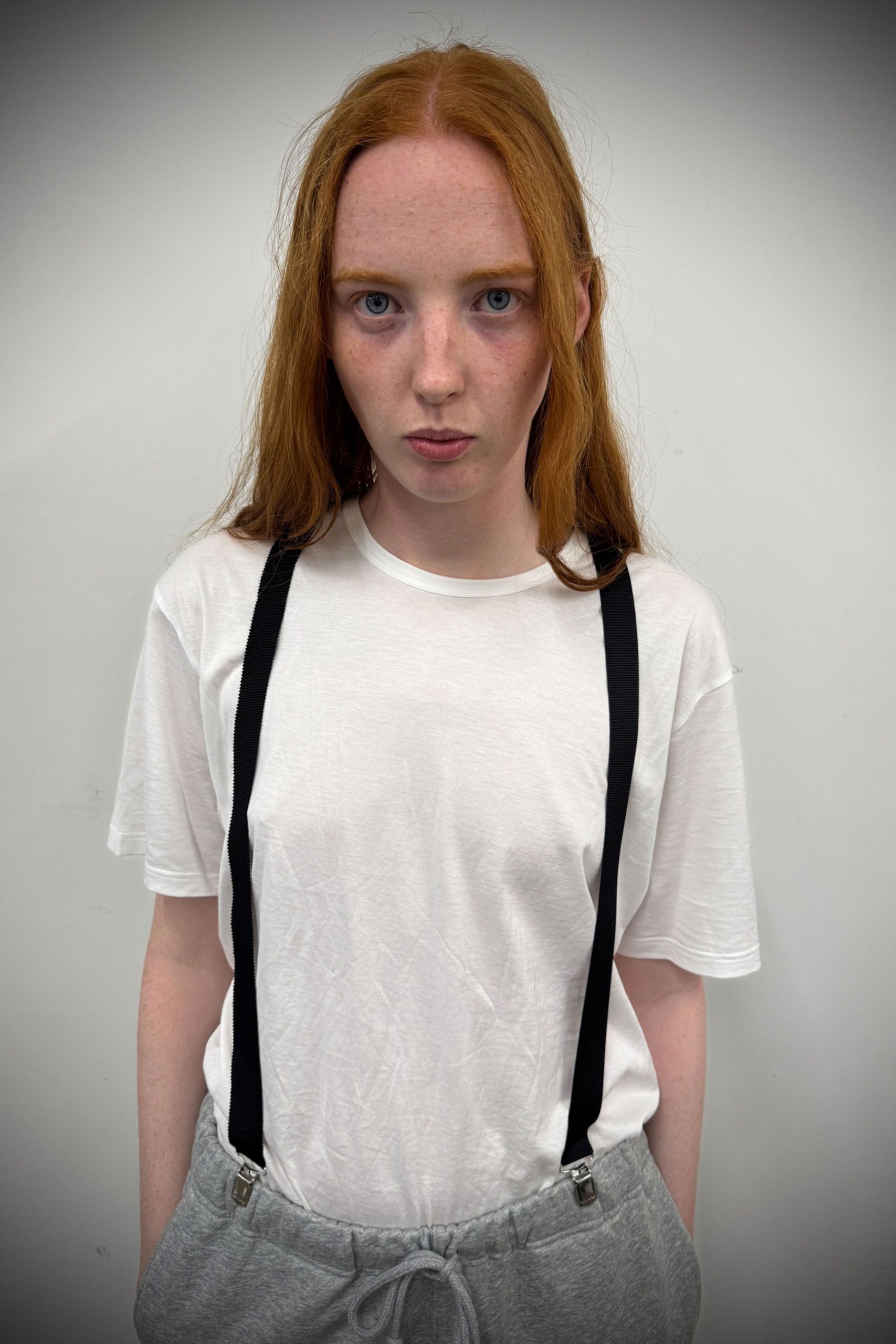 white t-shirt gray pants