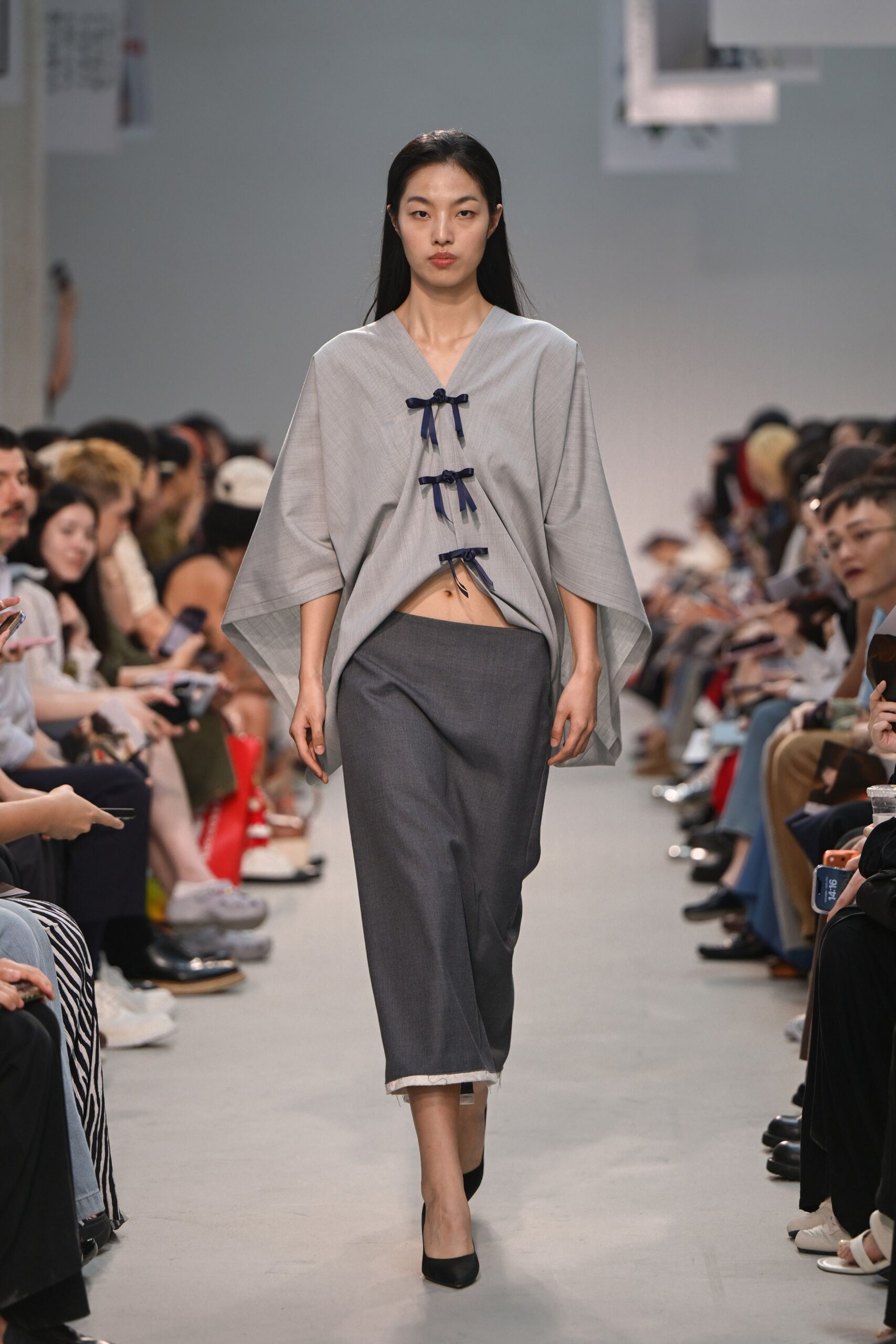 gray relaxed top and fitted skirt