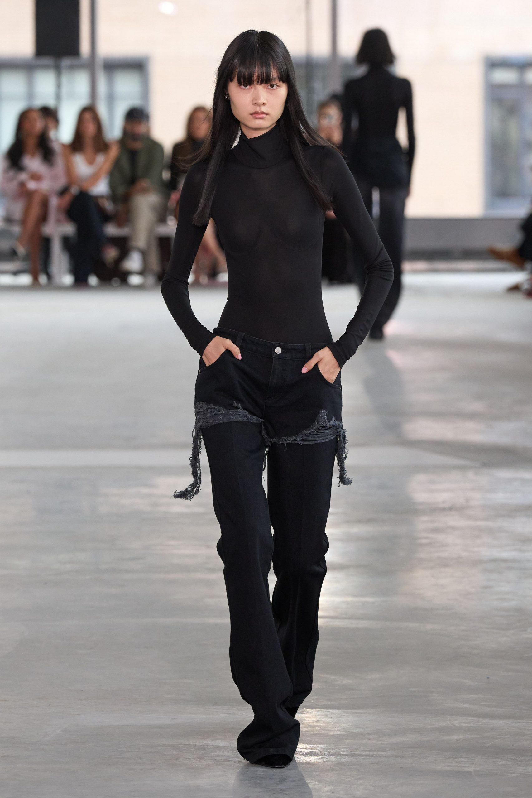 black fitted top and flared pants