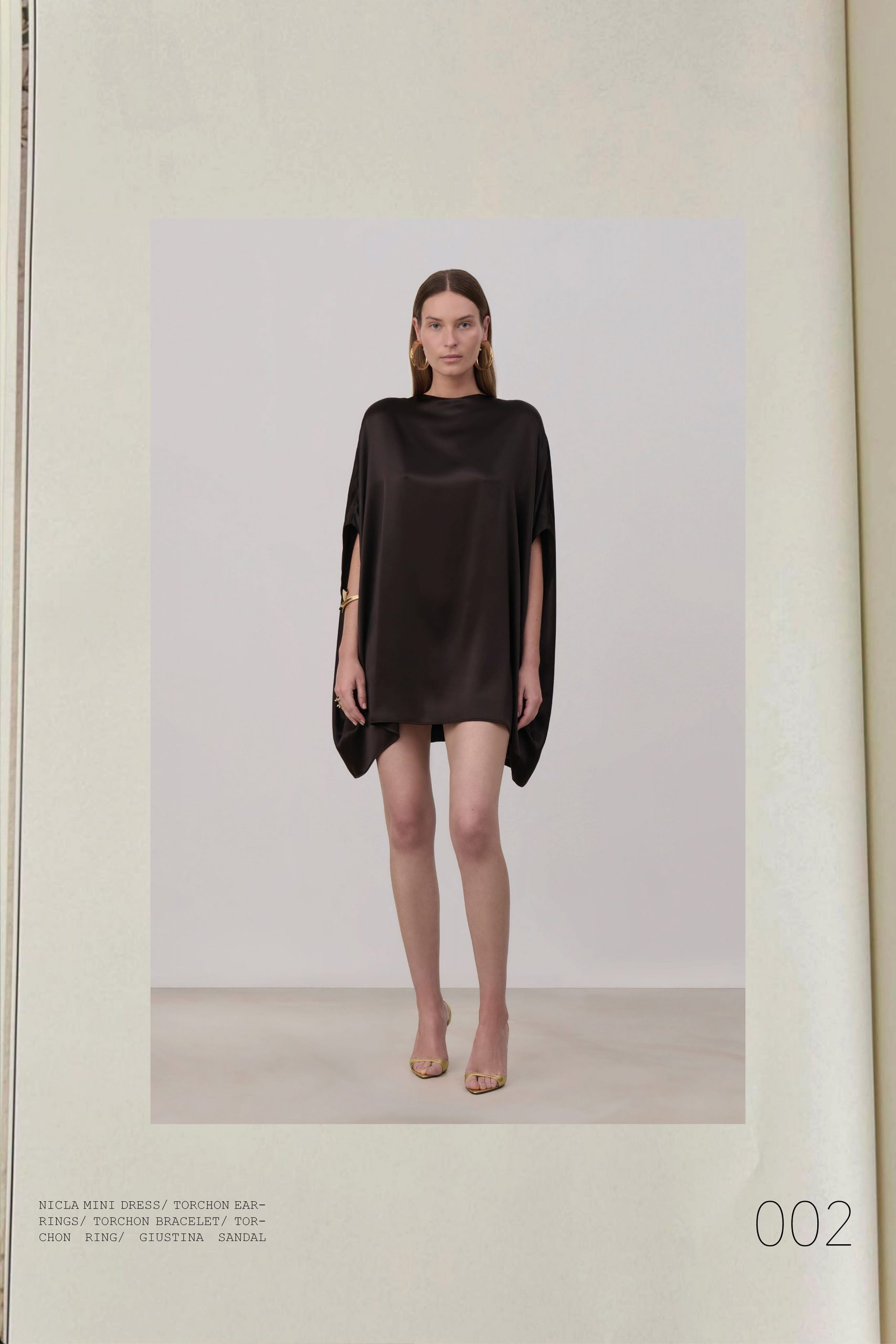 black silk mini dress with gold sandals