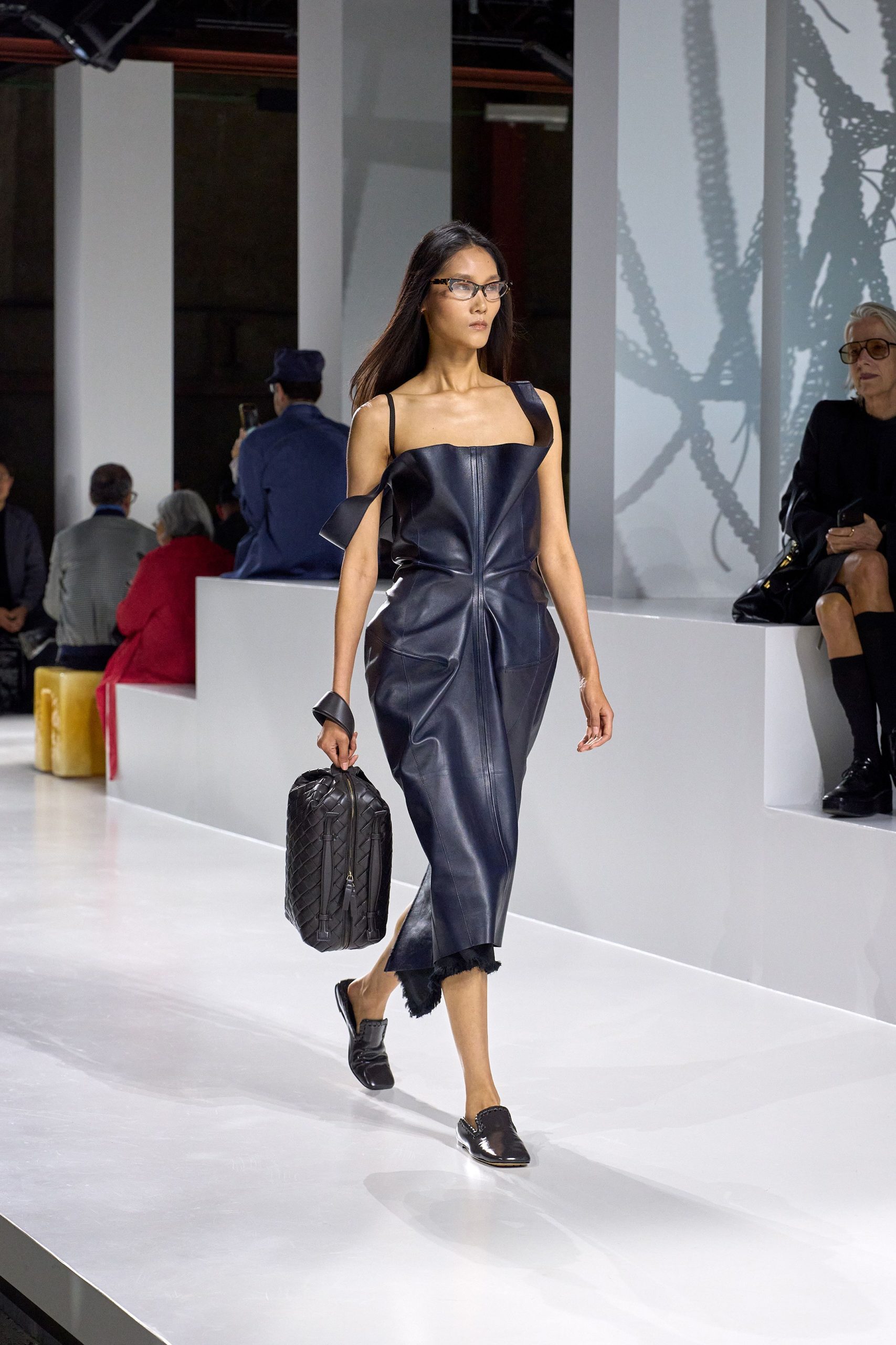black leather sleeveless off-shoulder fitted pleated draped dress