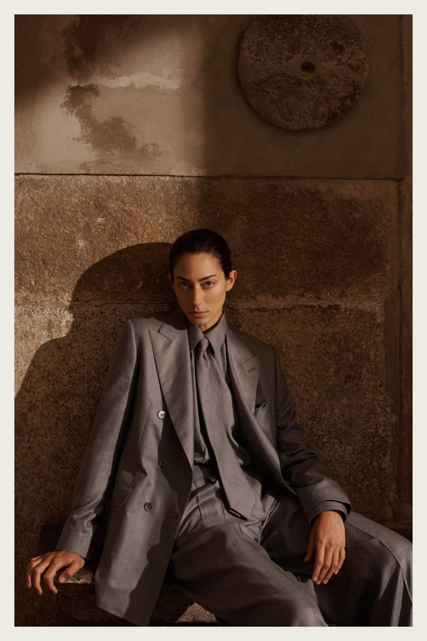 gray tailored suit with tie