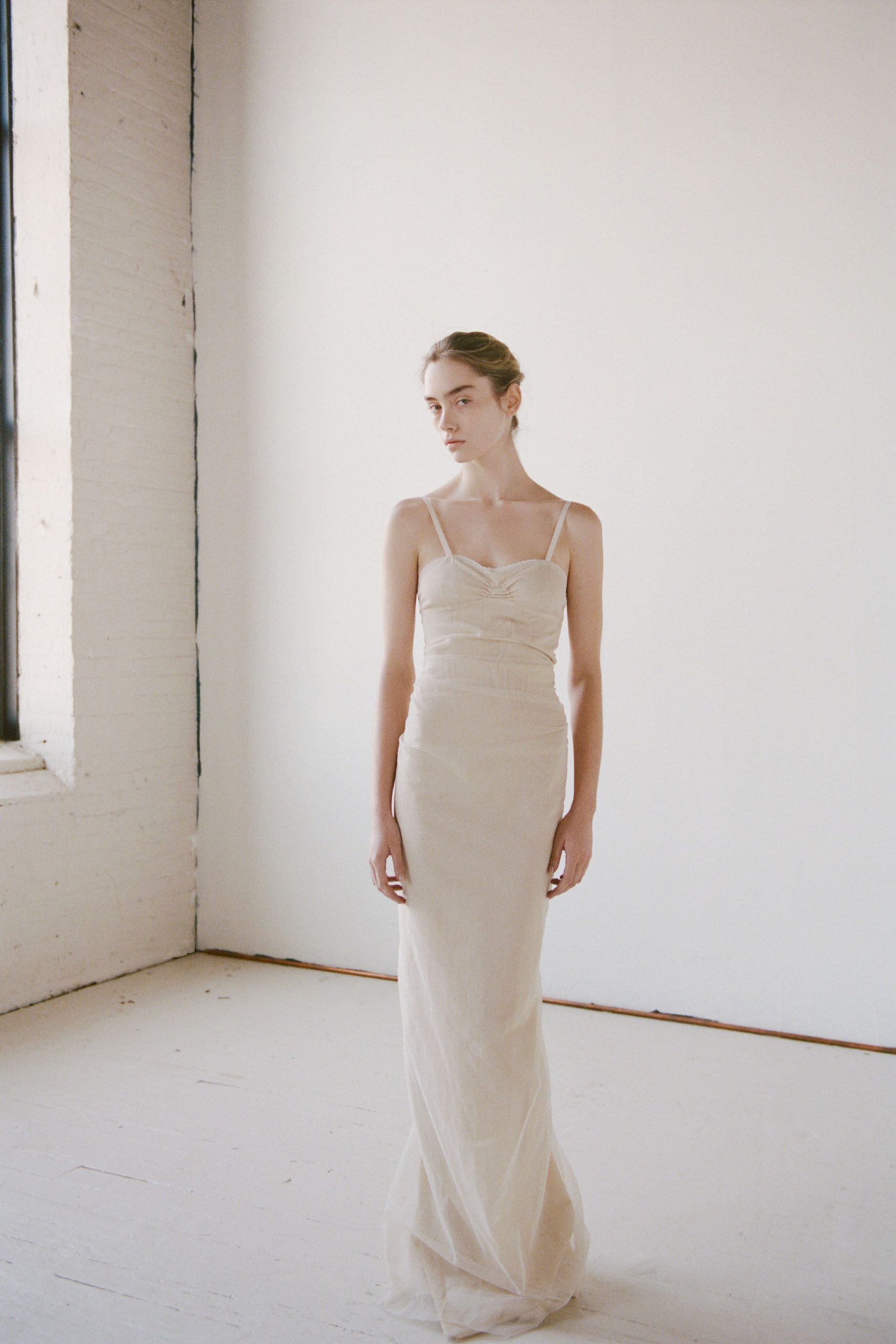 beige silk sleeveless gown