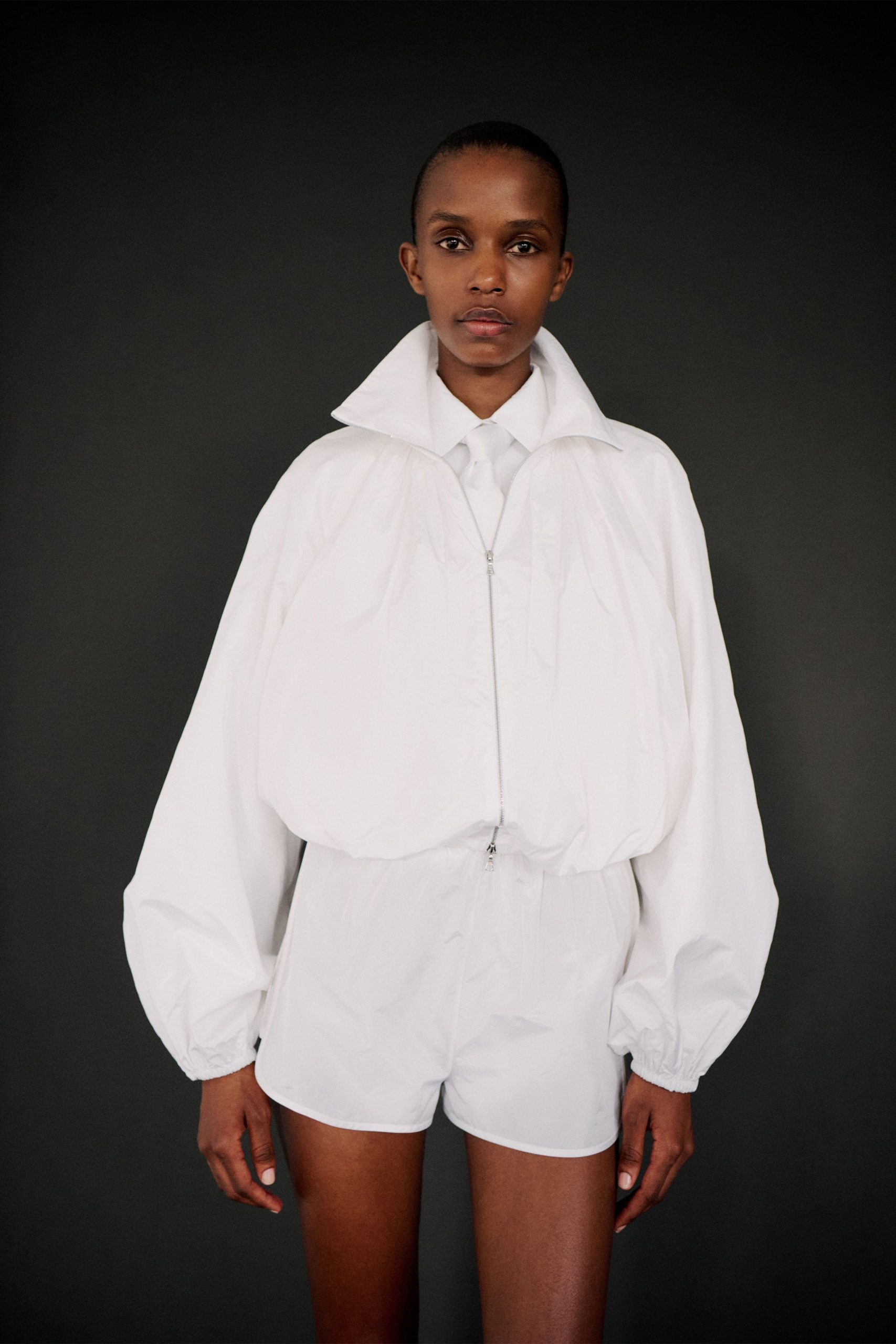 white cotton long-sleeve collared relaxed zippered padded jacket