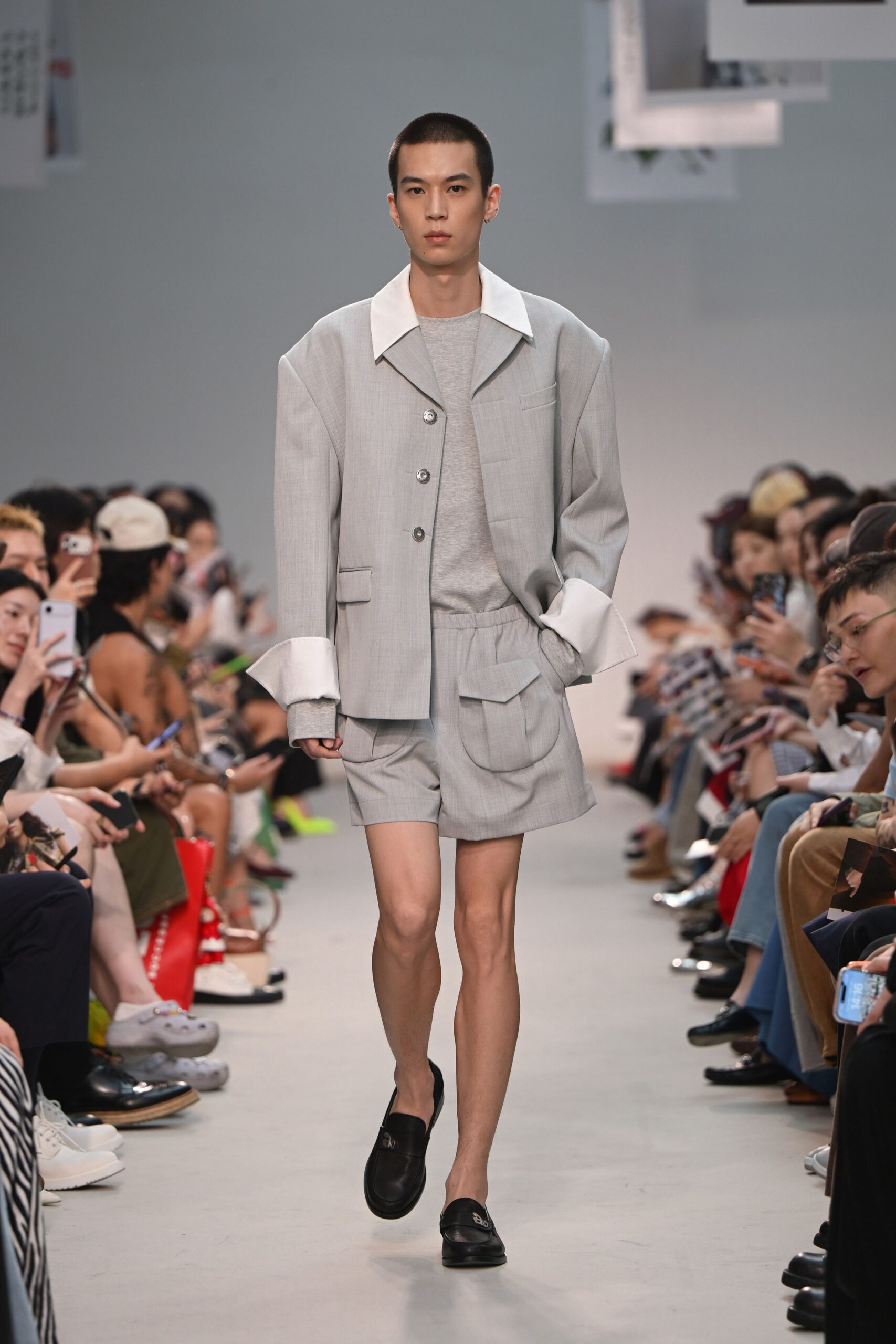 gray oversized jacket with tailored shorts