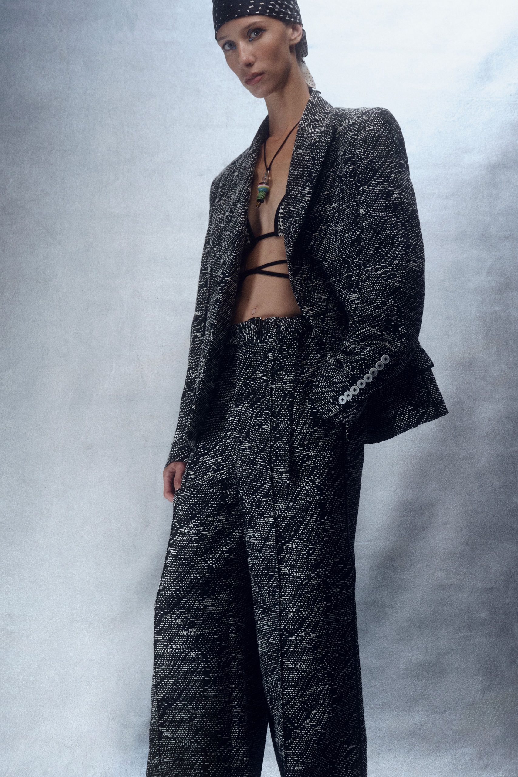 black cotton long-sleeve collared structured printed blazer