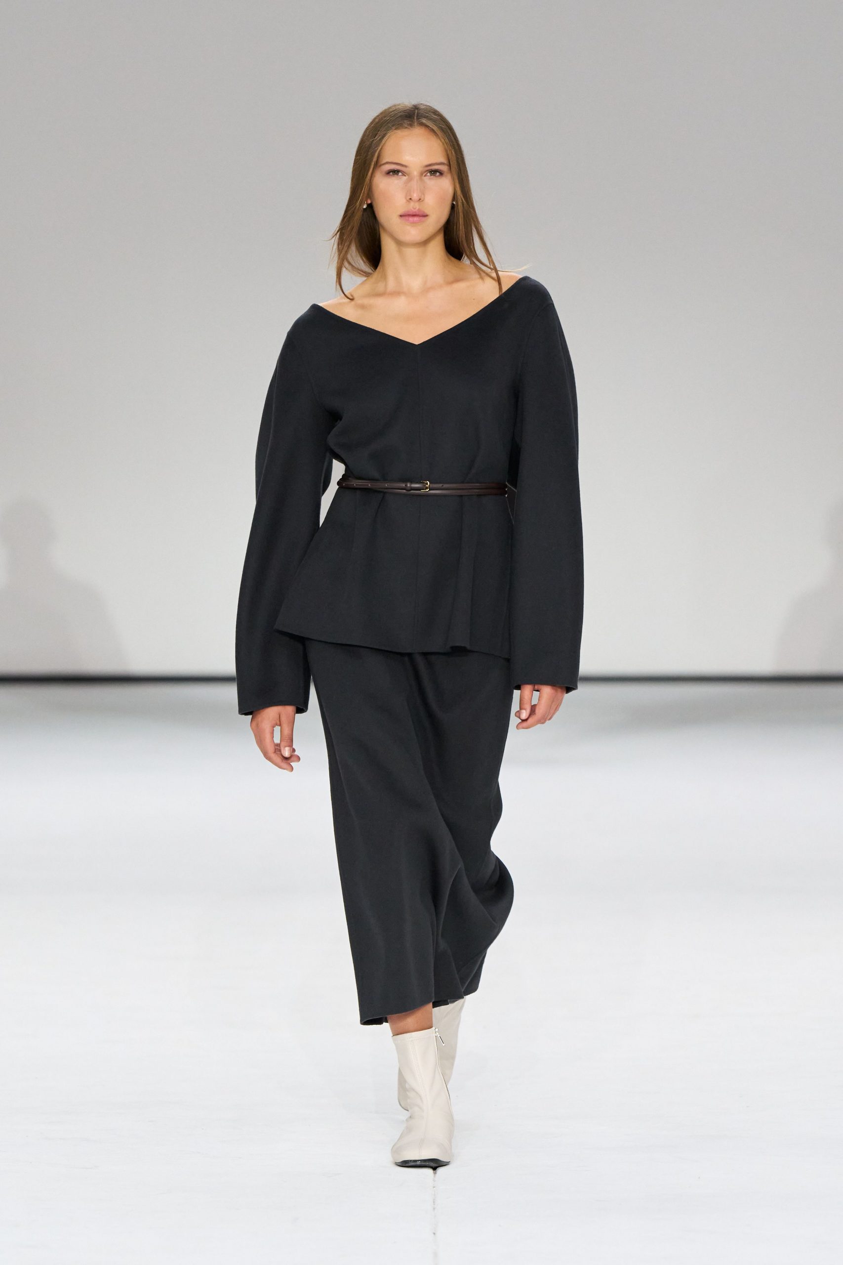 black relaxed midi dress with white shoes