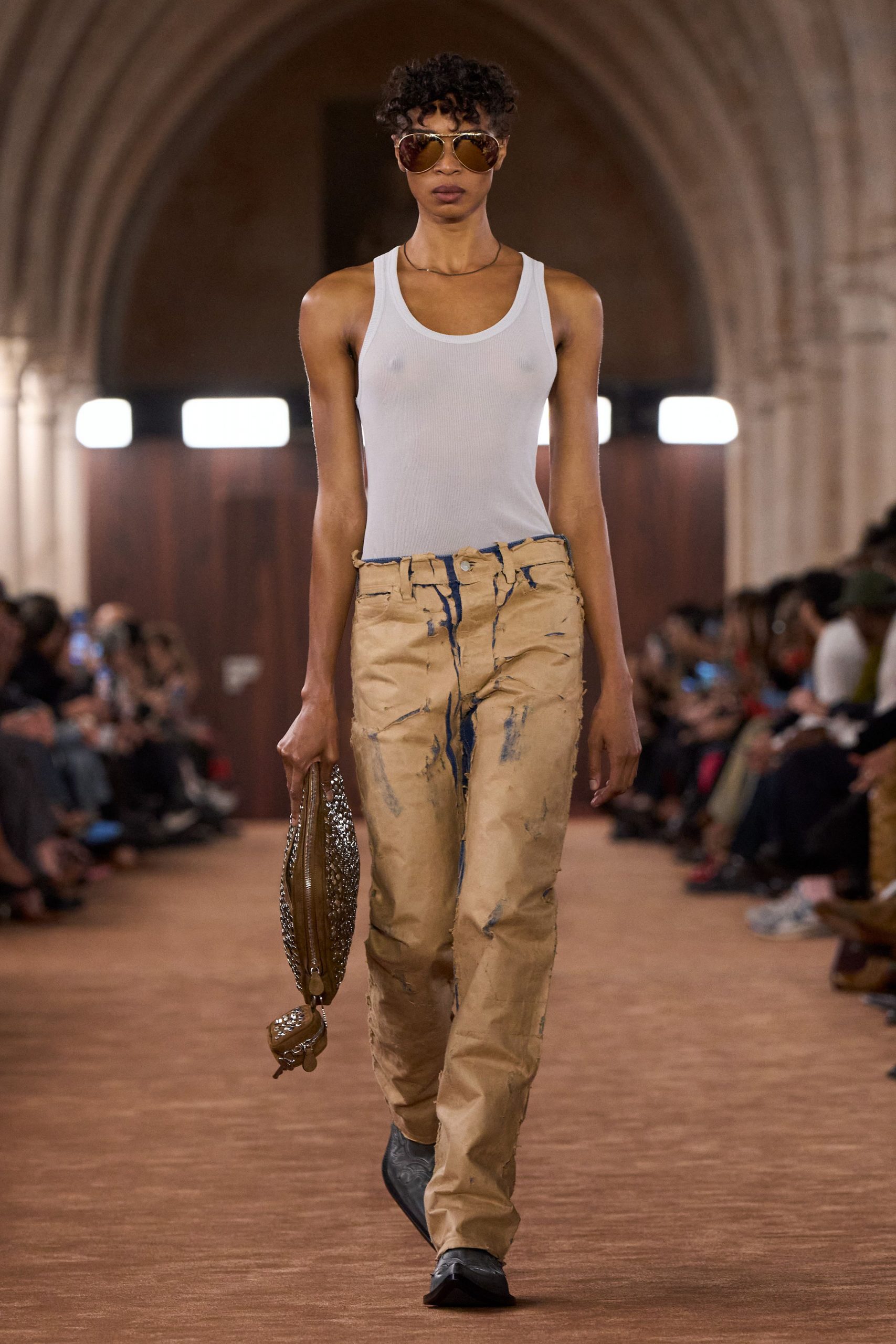 white tank-top beige pants
