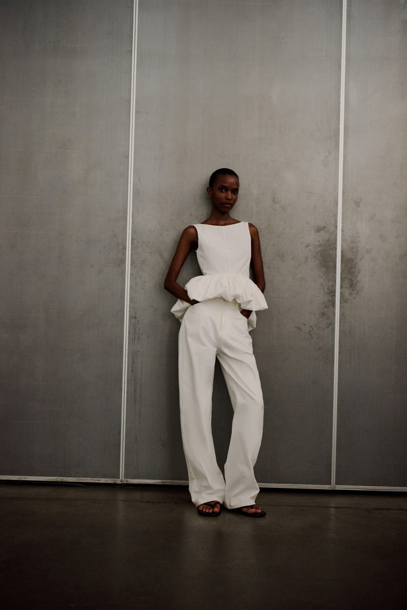 white layered top with relaxed pants
