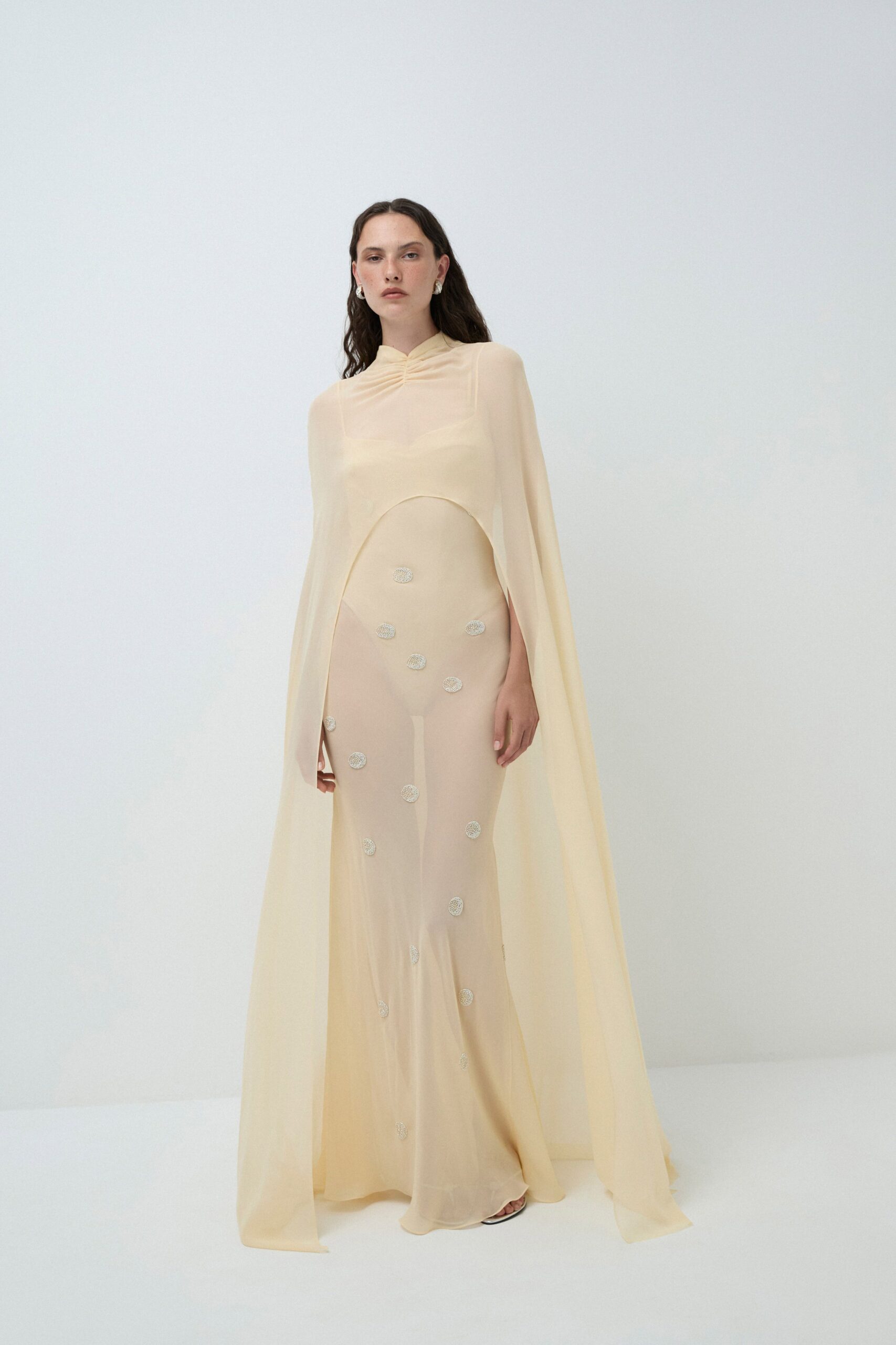 beige silk sleeveless high-neck fitted layered embroidered gown