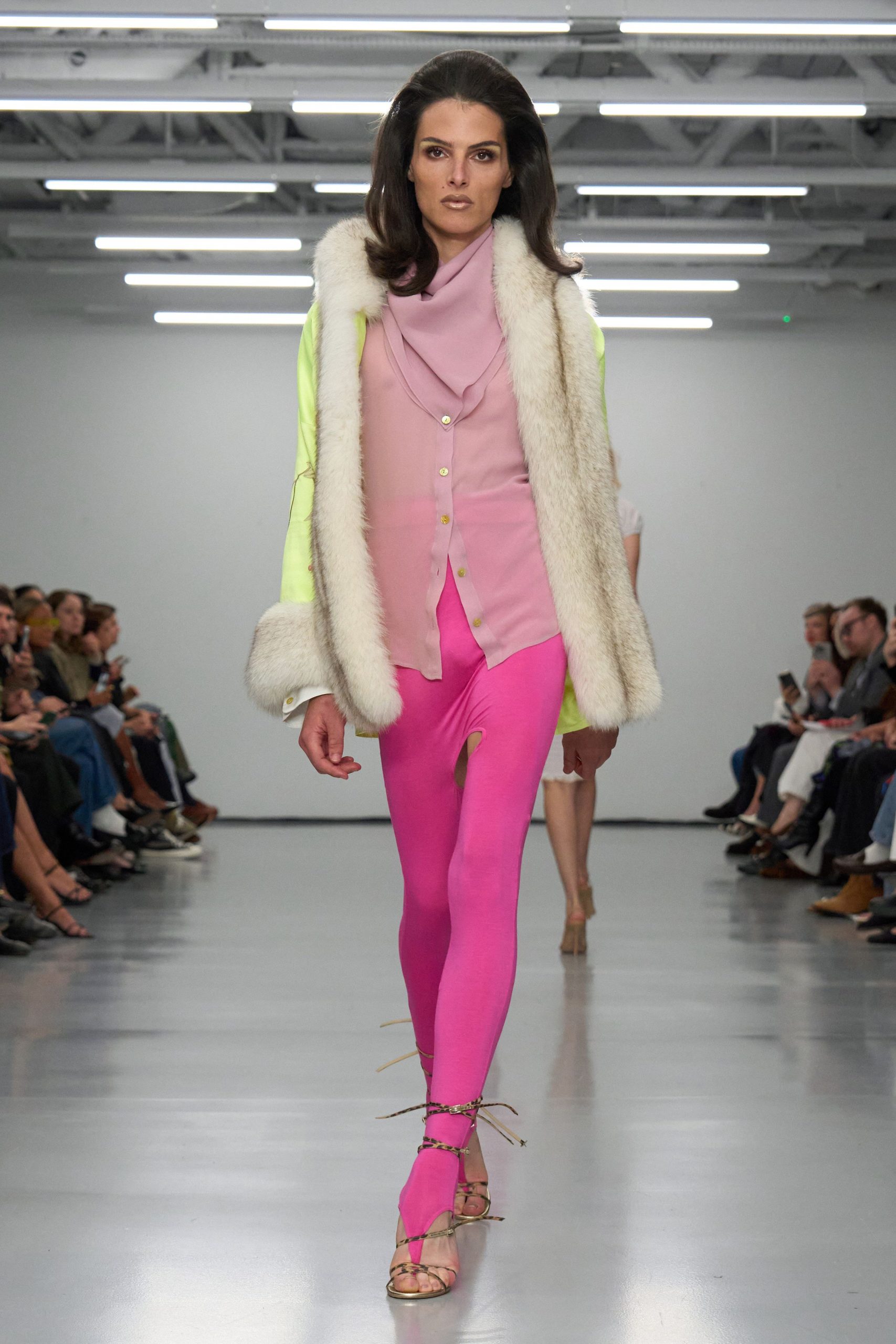 pink silk shirt with white fur coat