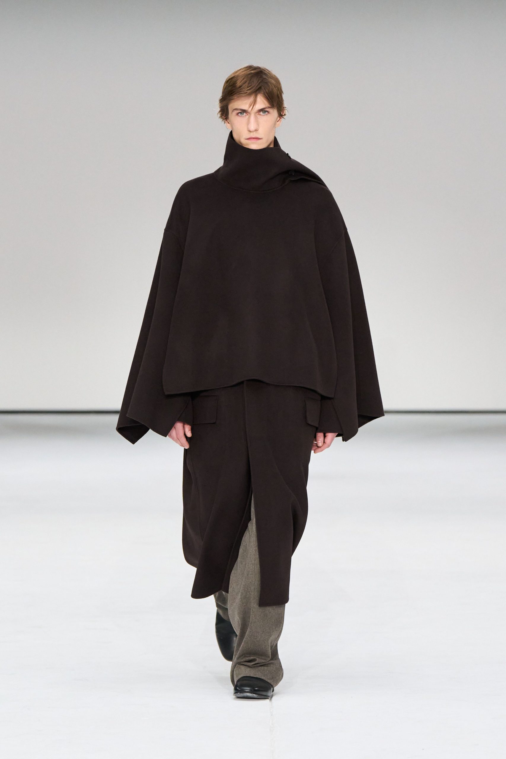 black wool sleeveless high-neck relaxed poncho