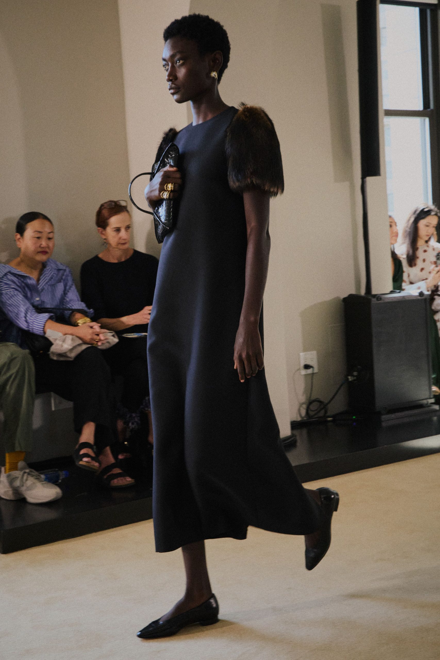 black fitted midi dress with short sleeves