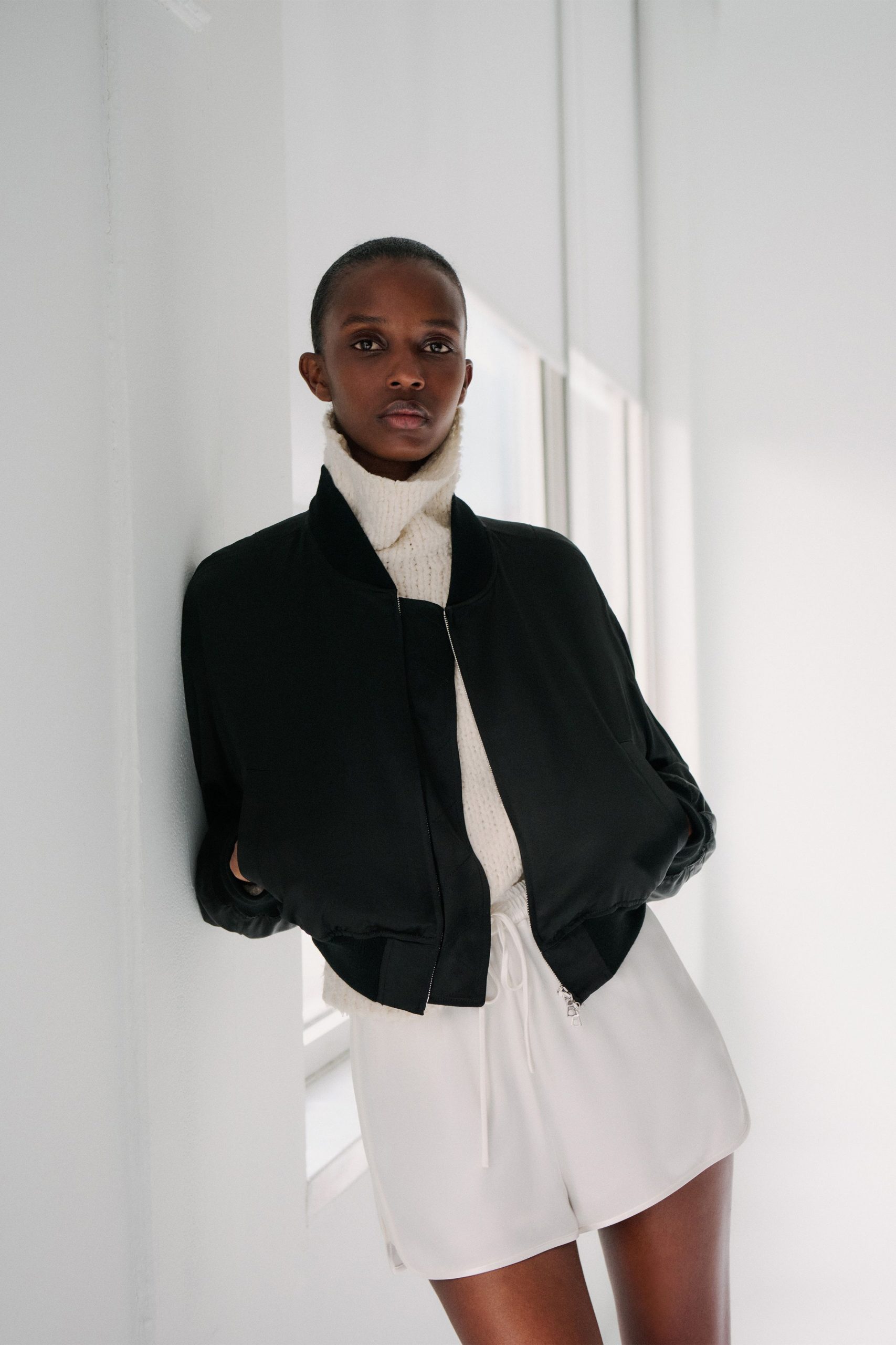 white knit turtleneck long-sleeve fitted top